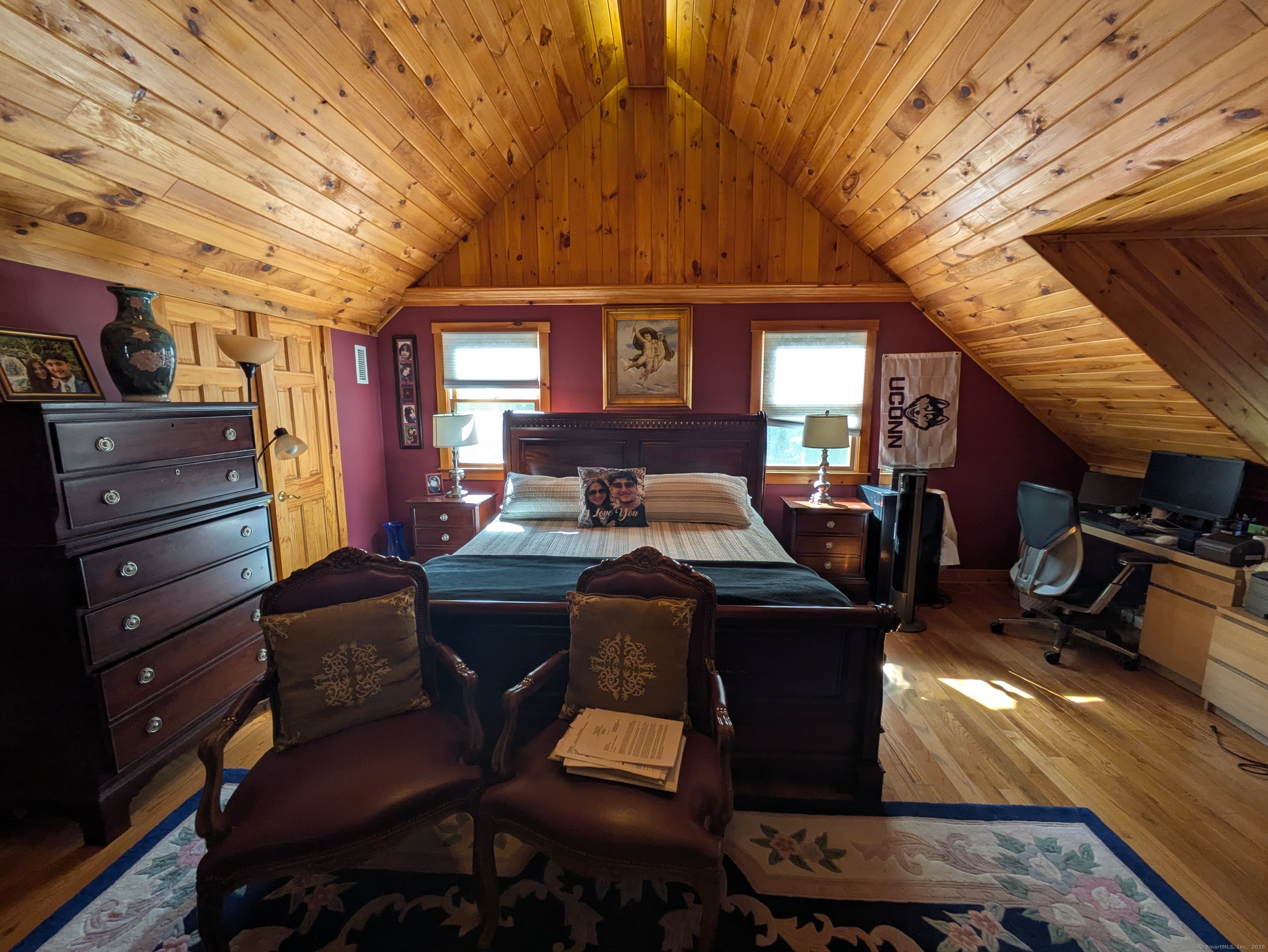541 Benson Road Middlebury, CT 06762 - Photo 14 of 24 a living room with furniture and a flat screen tv
