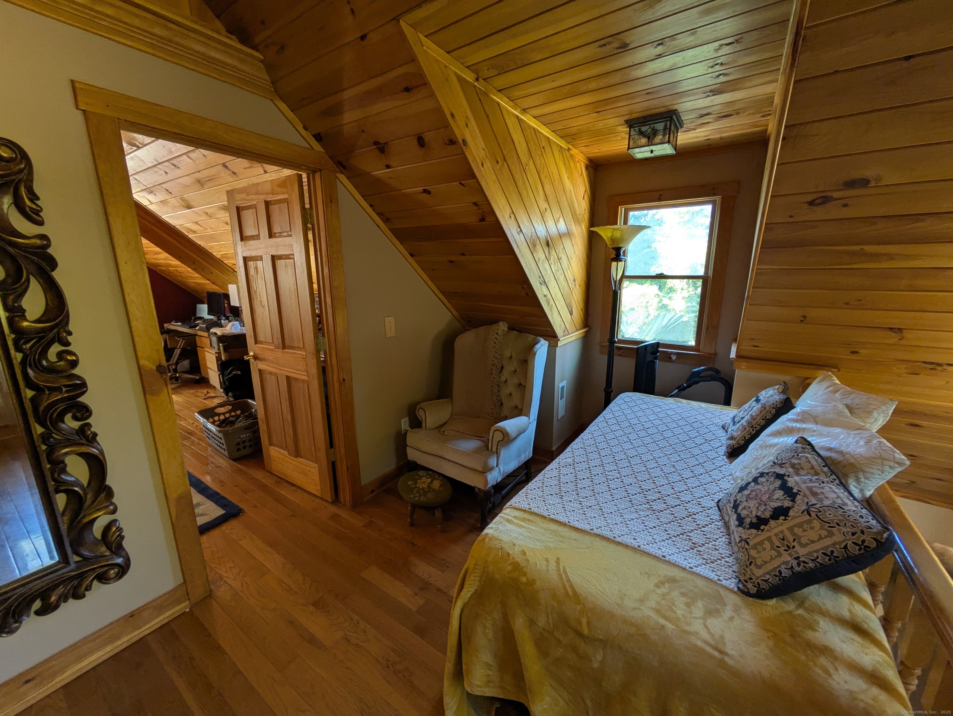541 Benson Road Middlebury, CT 06762 - Photo 21 of 24 a bedroom with bed and a window