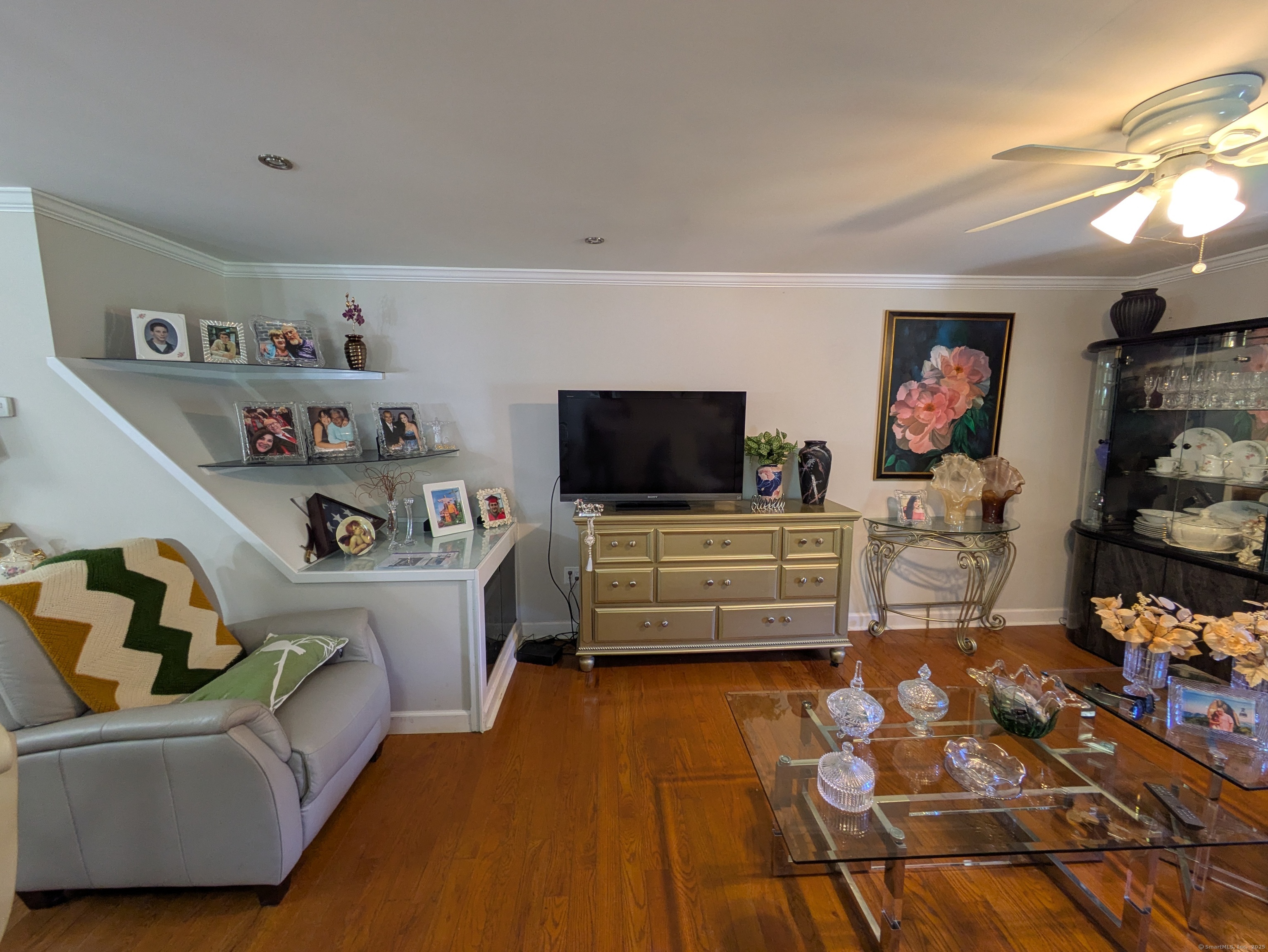 541 Benson Road Middlebury, CT 06762 - Photo 8 of 24 a living room with furniture and a flat screen tv