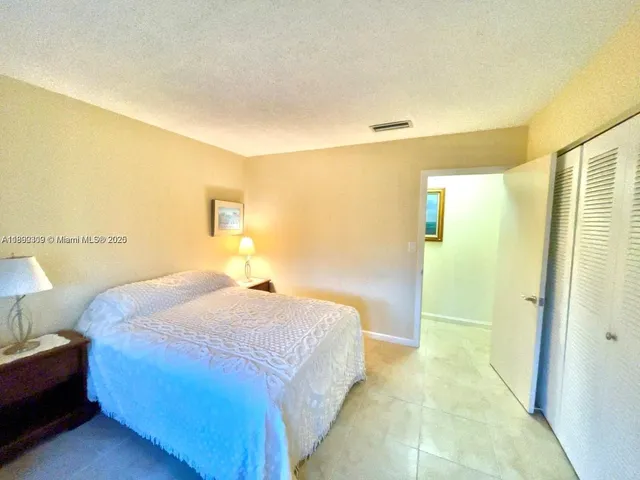 a bathroom with a sink and shower