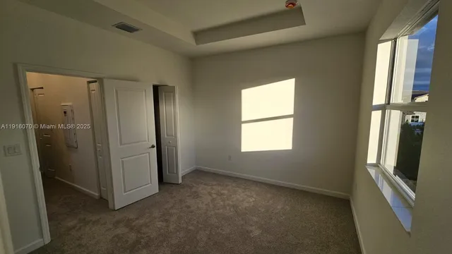 an empty room with windows