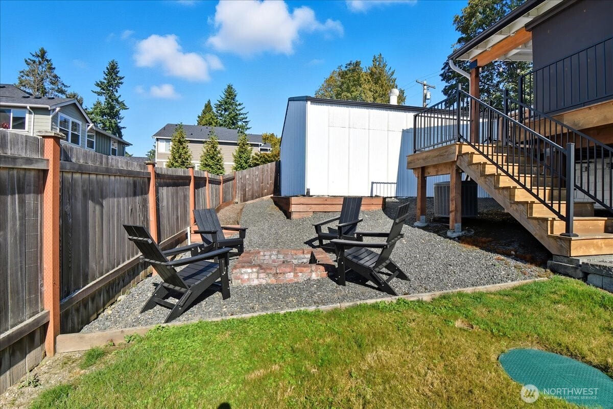 7130 Foster Slough Road Snohomish, WA 98290 - Photo 29 of 38 a view of a backyard with sitting area