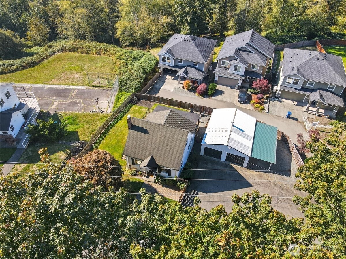 7130 Foster Slough Road Snohomish, WA 98290 - Photo 34 of 38 an aerial view of a house with garden space and street view