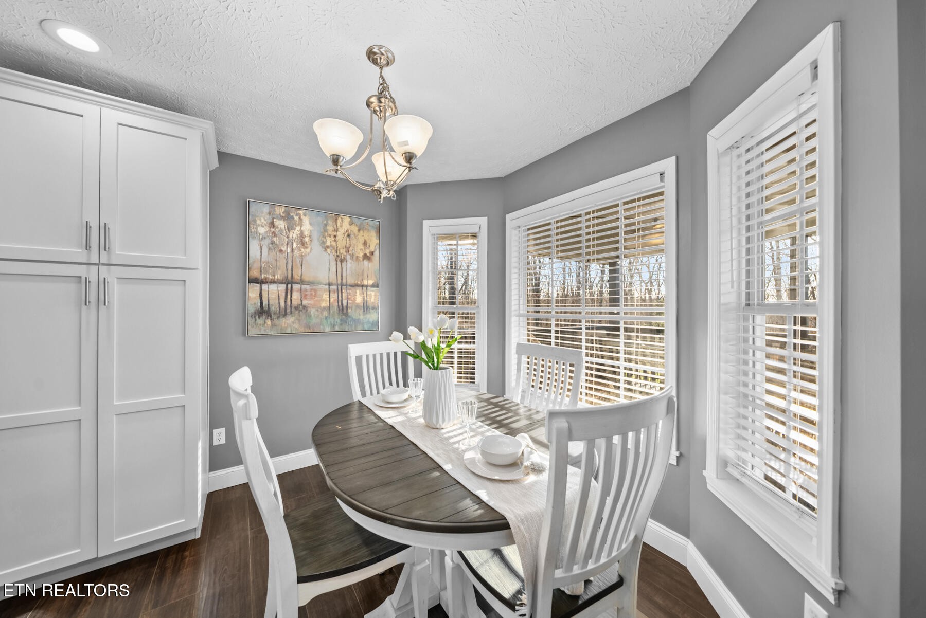 1378 Pow Camp Road Crossville, TN 38572 - Photo 16 of 59 a view of a dining room with furniture window and wooden floor