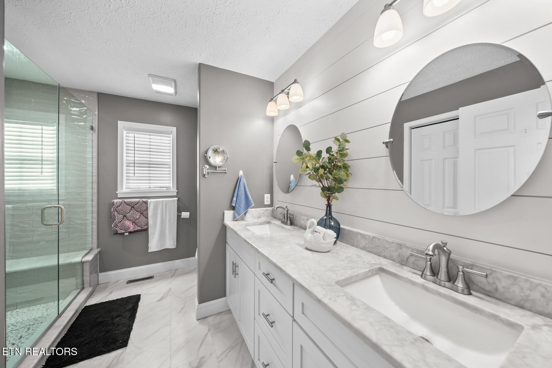 1378 Pow Camp Road Crossville, TN 38572 - Photo 25 of 59 a spacious bathroom with a granite countertop sink mirror and shower