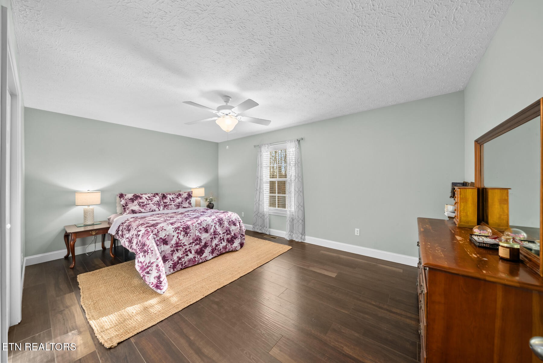 1378 Pow Camp Road Crossville, TN 38572 - Photo 27 of 59 a living room with a bed furniture and a flat screen tv