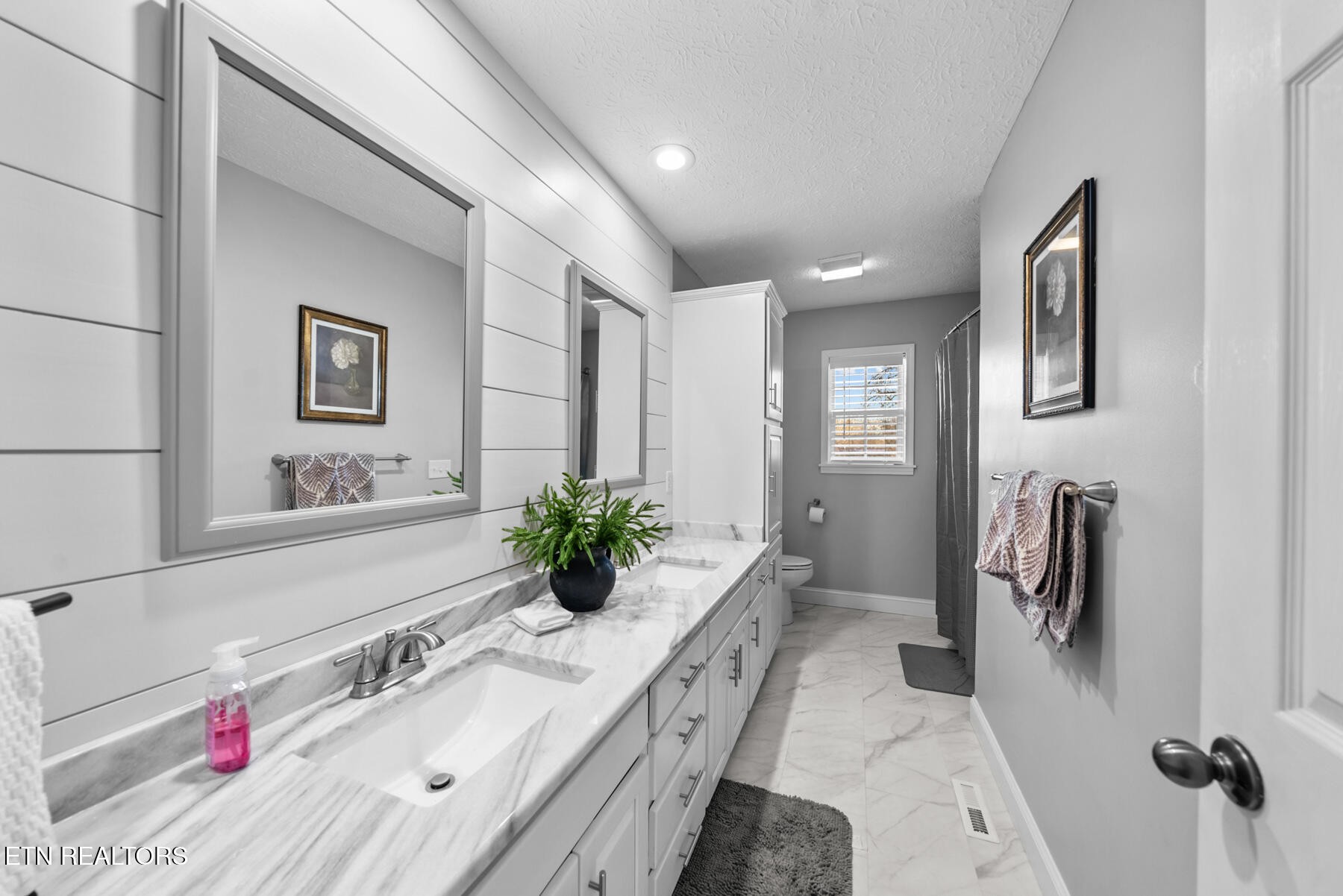 1378 Pow Camp Road Crossville, TN 38572 - Photo 31 of 59 a bathroom with a tub sink and mirror