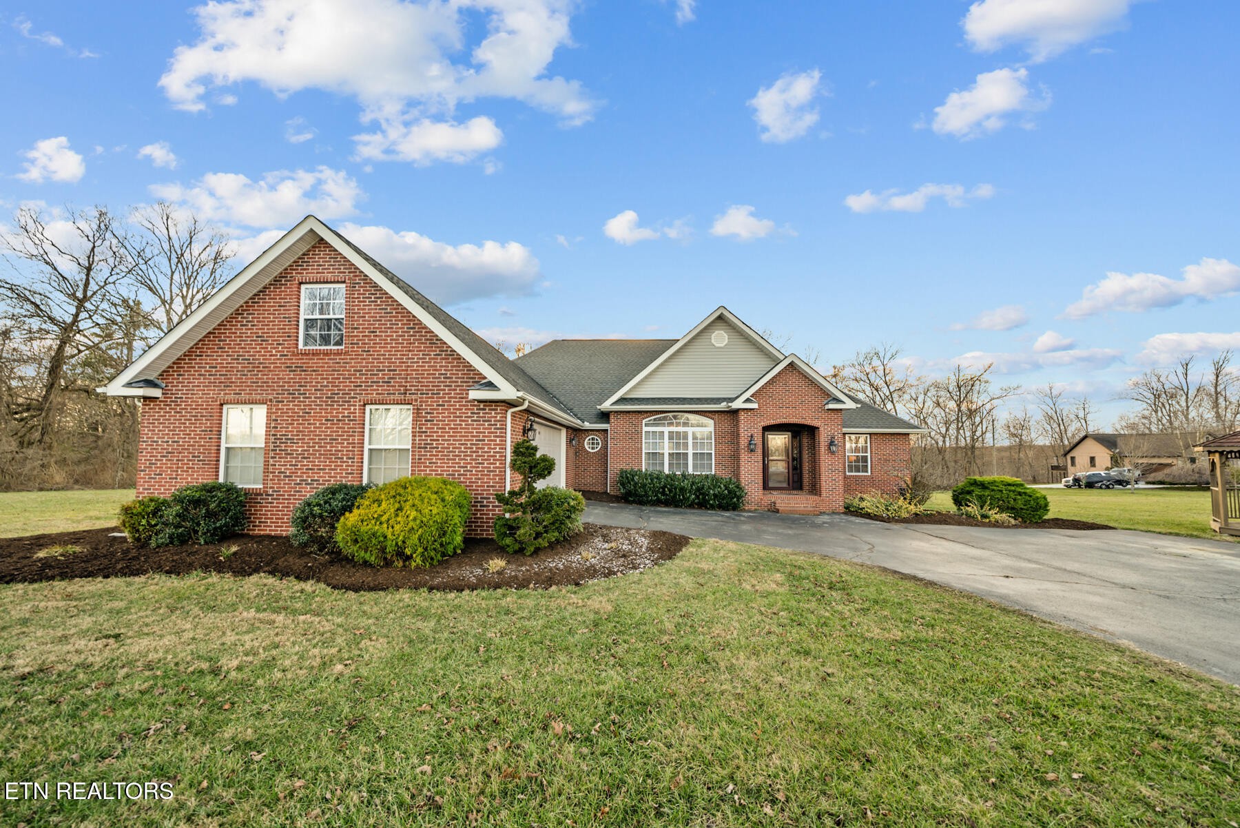 1378 Pow Camp Road Crossville, TN 38572 - Photo 52 of 59 a front view of a house with a yard