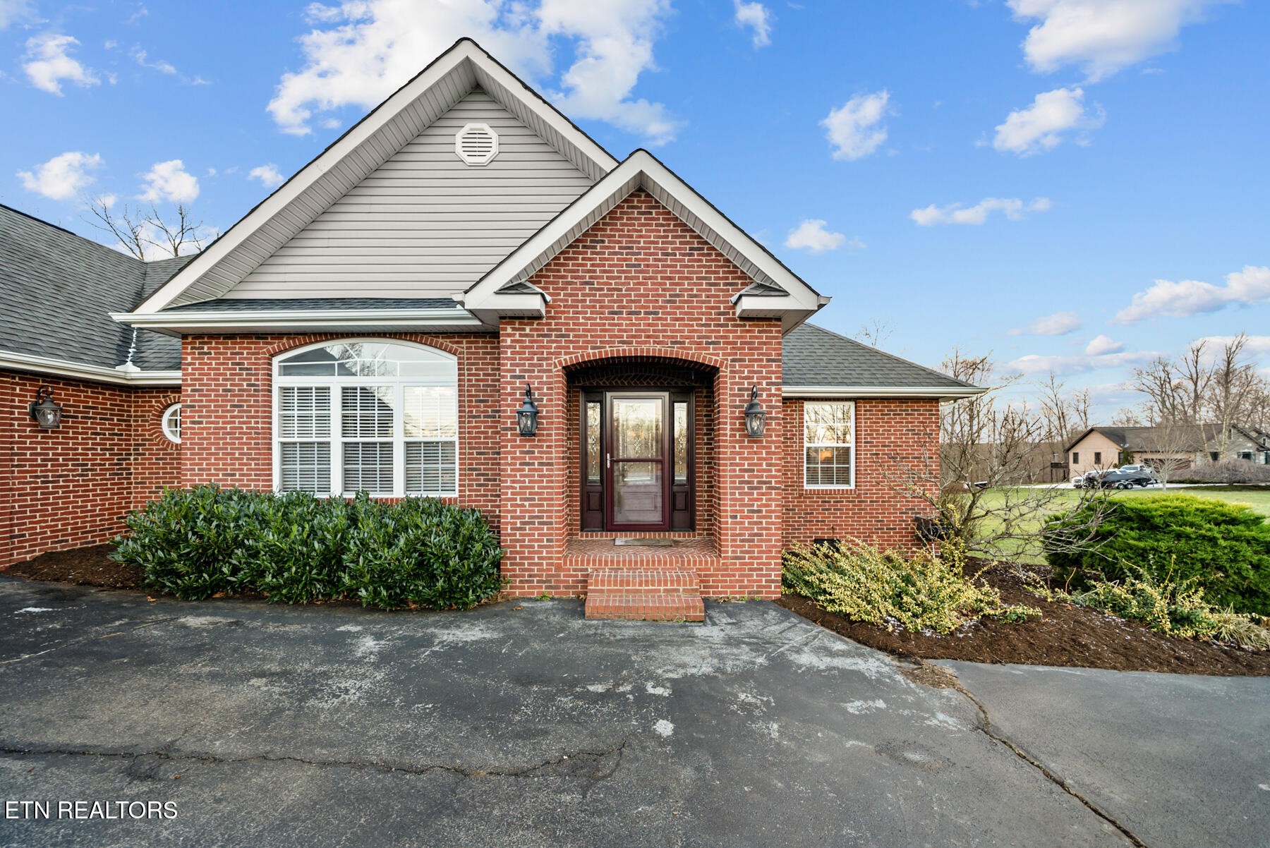 1378 Pow Camp Road Crossville, TN 38572 - Photo 53 of 59 a front view of a house with garden