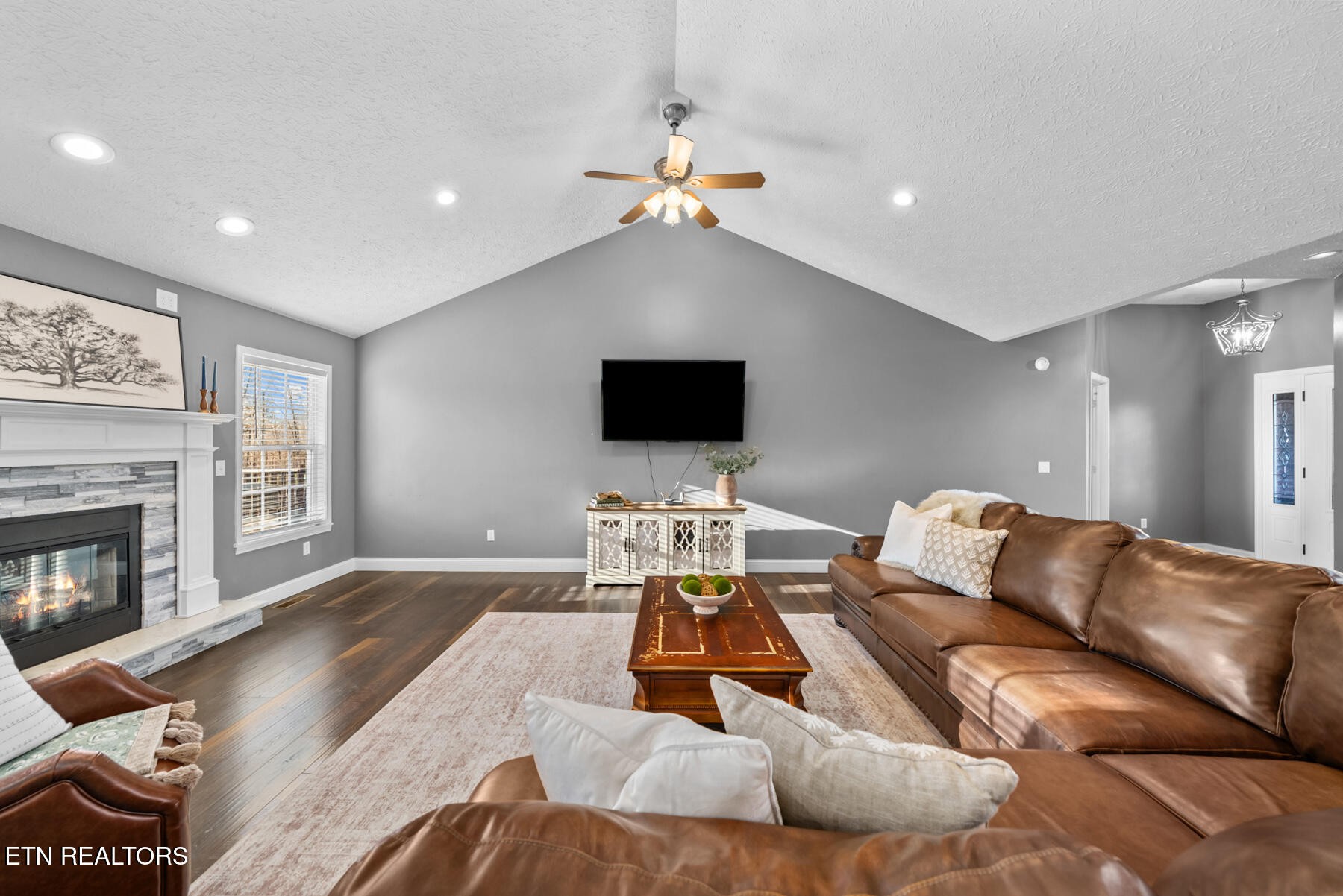 1378 Pow Camp Road Crossville, TN 38572 - Photo 7 of 59 a living room with furniture and a flat screen tv