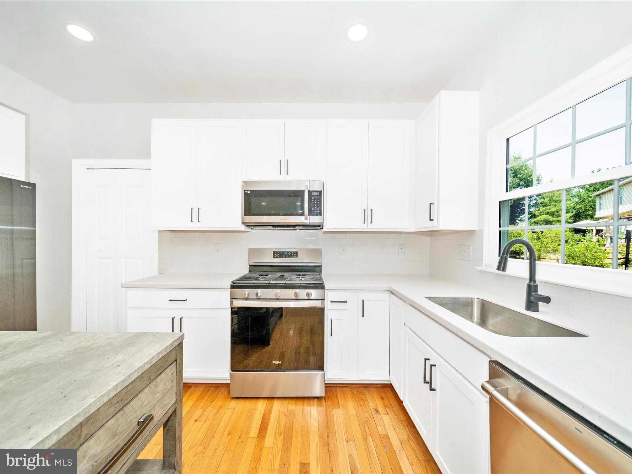 1764 Algonquin Road Frederick, MD 21701 - Photo 15 of 64 a kitchen with stainless steel appliances a stove sink and cabinets