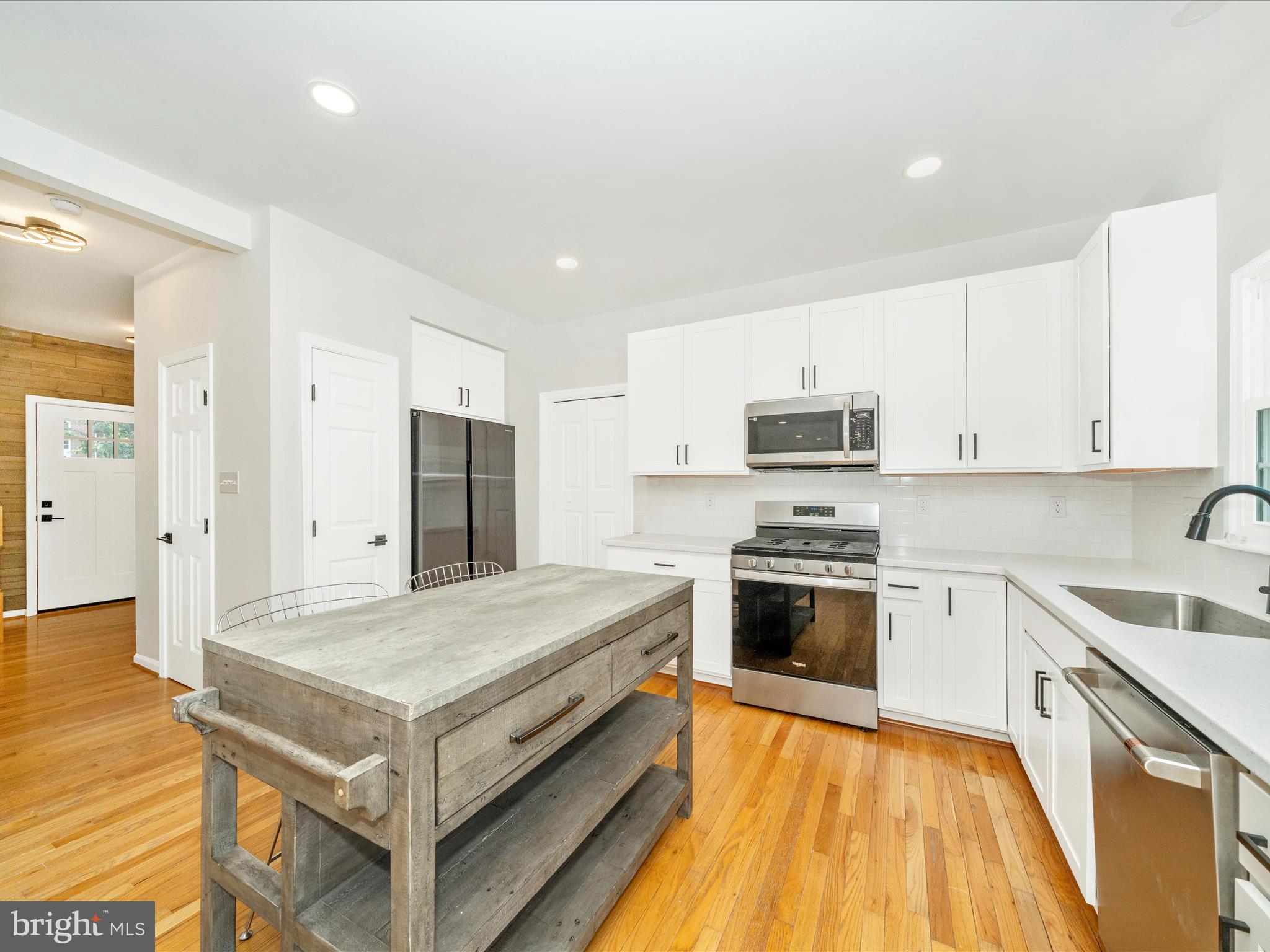 1764 Algonquin Road Frederick, MD 21701 - Photo 2 of 64 a kitchen with a stove and a sink