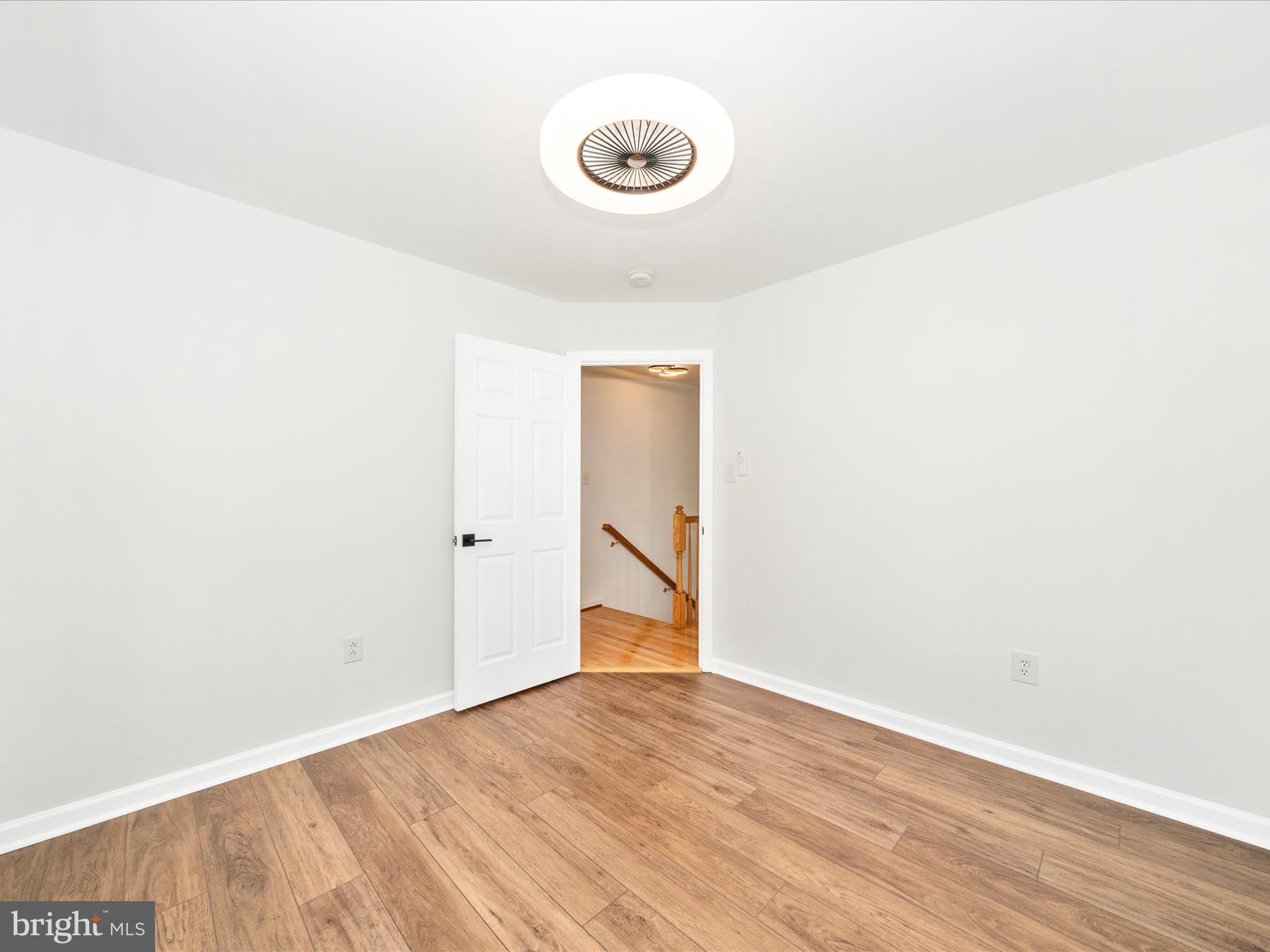 1764 Algonquin Road Frederick, MD 21701 - Photo 25 of 64 a view of an empty room with wooden floor
