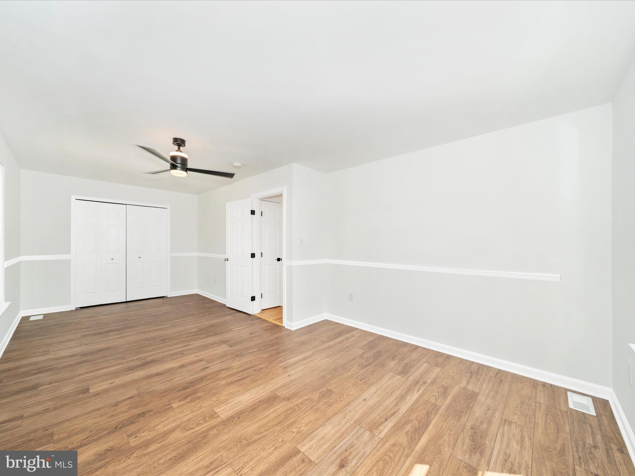 1764 Algonquin Road Frederick, MD 21701 - Photo 29 of 64 a view of empty room with wooden floor
