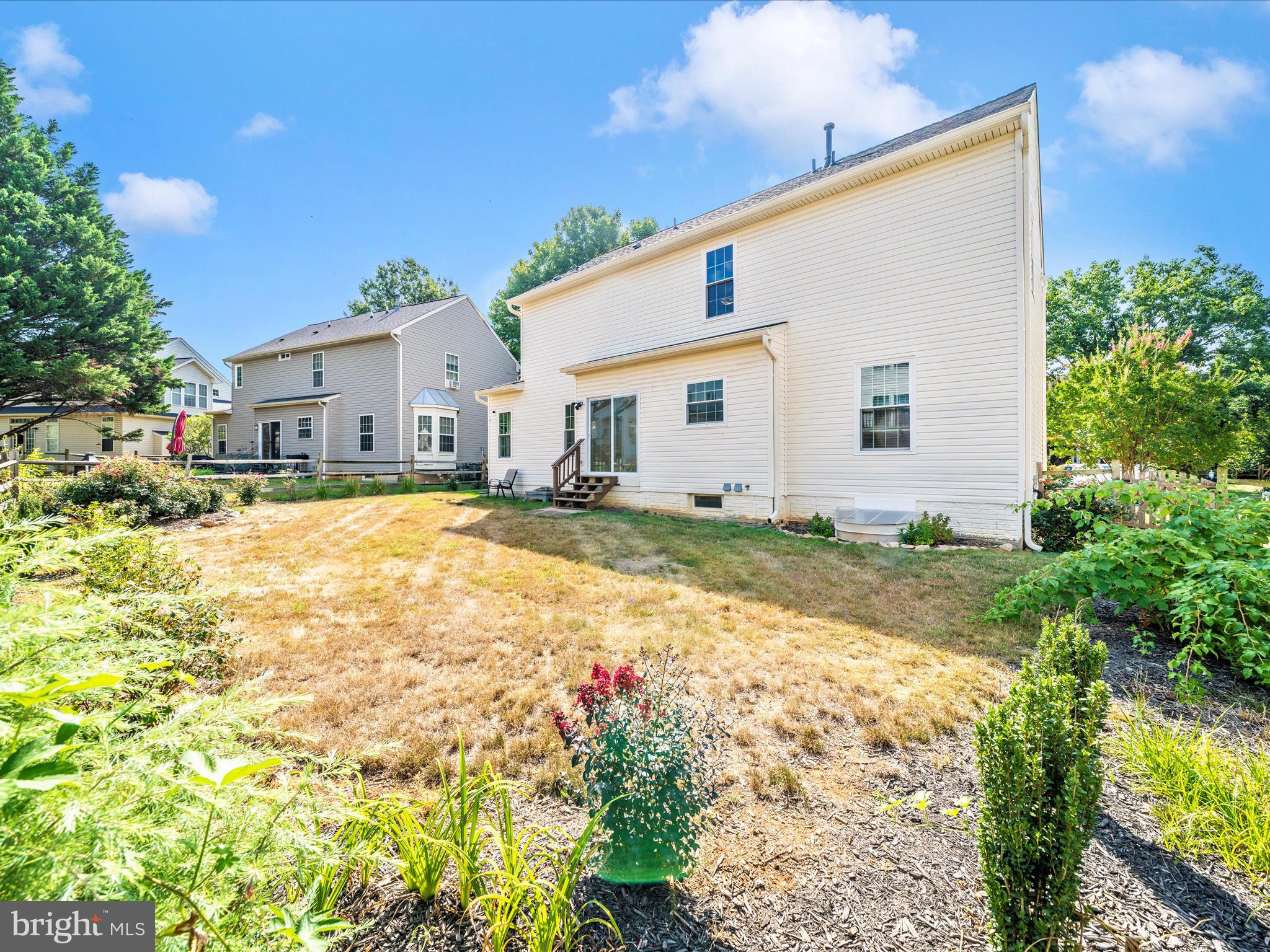 1764 Algonquin Road Frederick, MD 21701 - Photo 36 of 64 a front view of house with yard and trees around