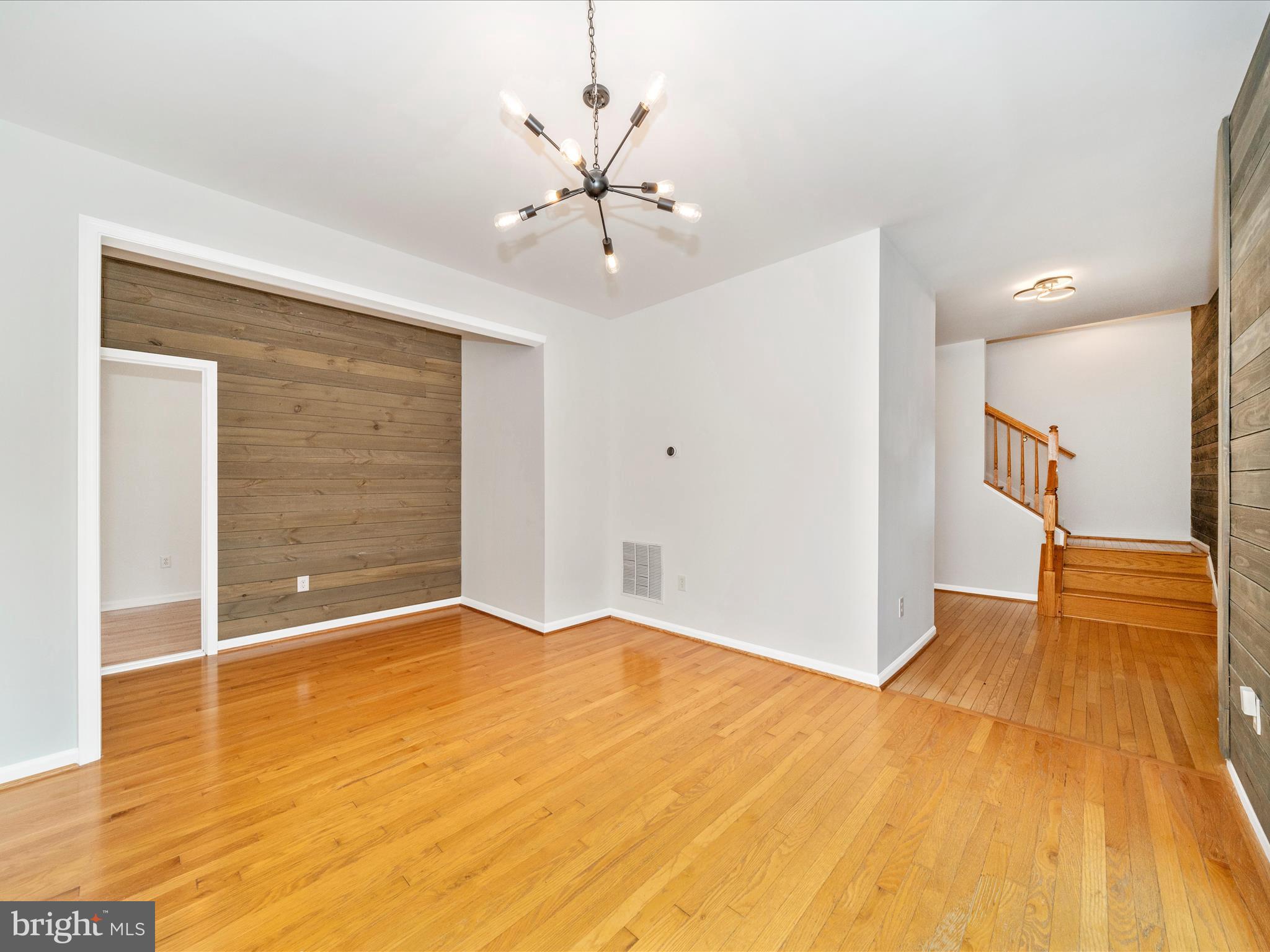 1764 Algonquin Road Frederick, MD 21701 - Photo 7 of 64 a view of an empty room with wooden floor