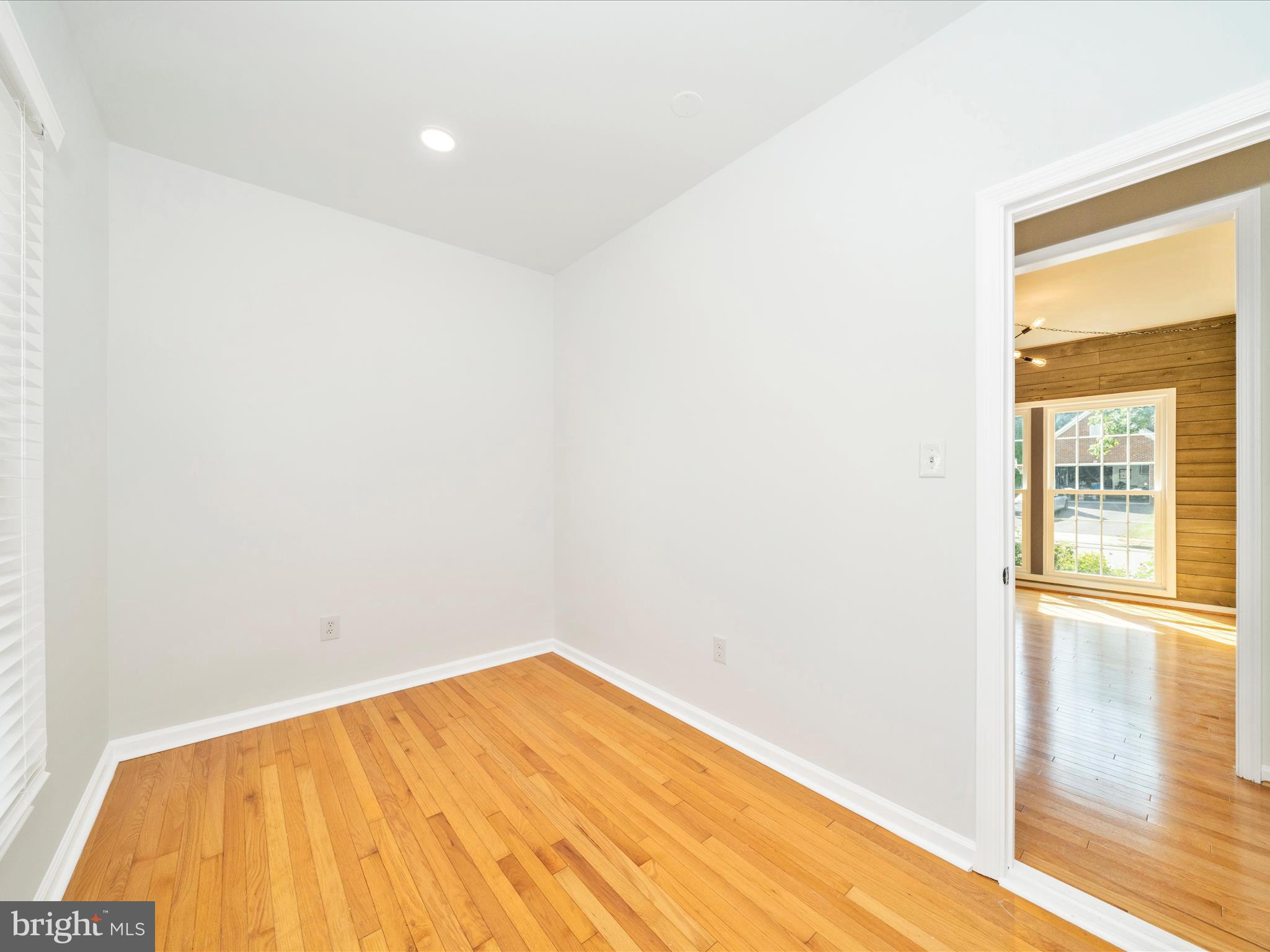 1764 Algonquin Road Frederick, MD 21701 - Photo 8 of 64 a view of empty room with wooden floor and fan