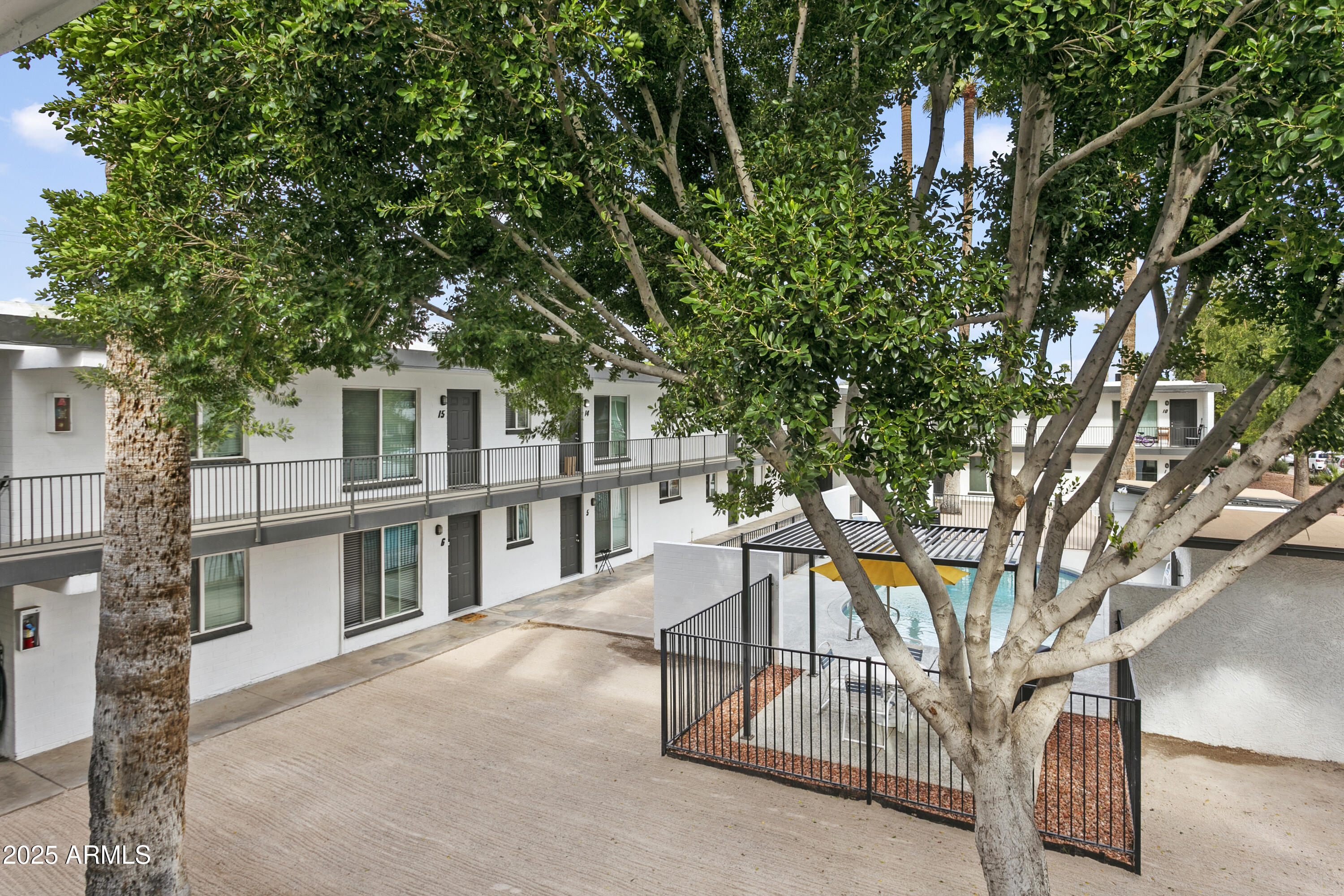 2014 West Berridge Lane Phoenix, AZ 85015 - Photo 2 of 23 a view of a house with a tree