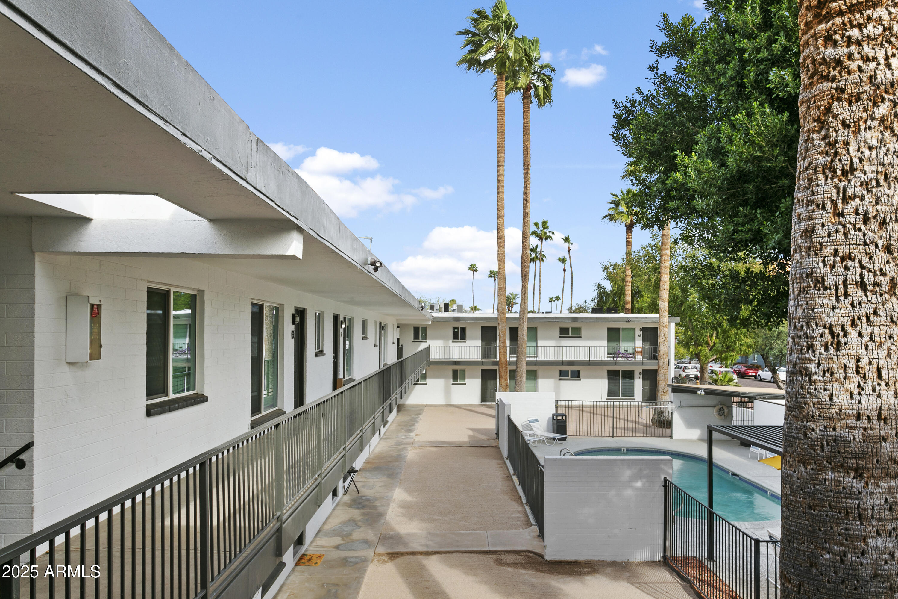 2014 West Berridge Lane Phoenix, AZ 85015 - Photo 3 of 23 a view of a patio with couches and table potted plants