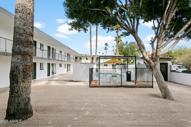 a view of a building with a tree