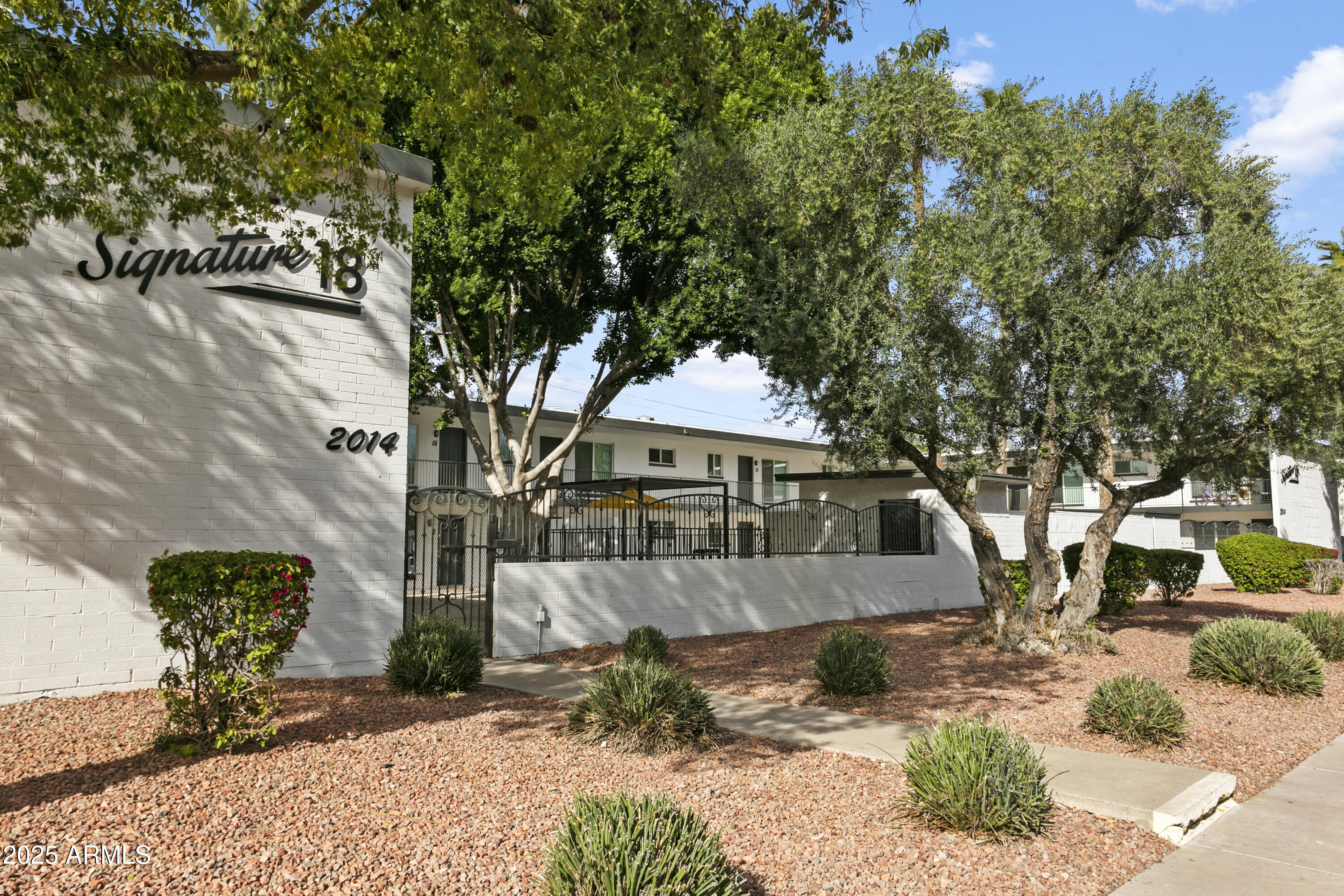 2014 West Berridge Lane Phoenix, AZ 85015 - Photo 6 of 23 a view of a house with backyard and sitting area