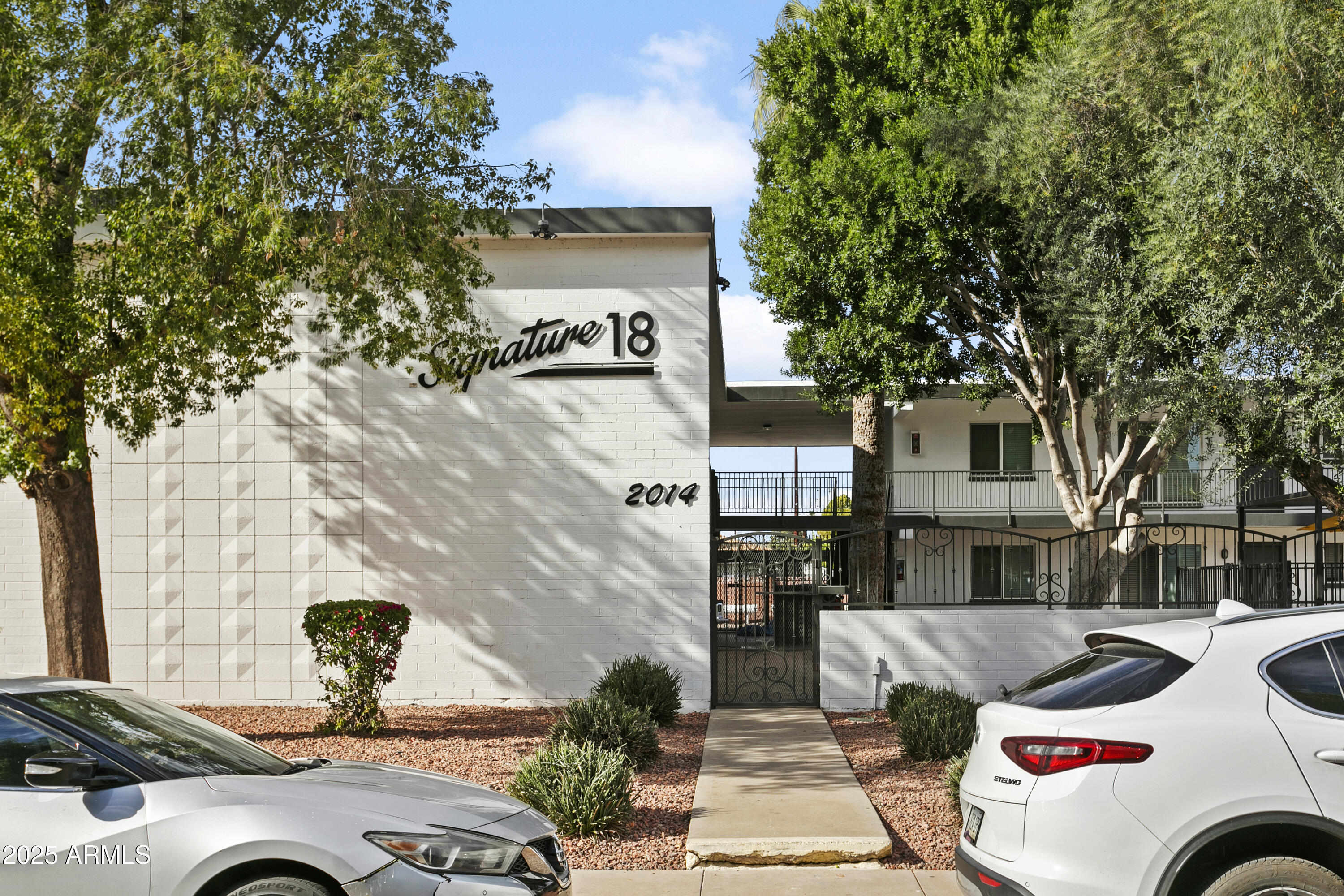 2014 West Berridge Lane Phoenix, AZ 85015 - Photo 7 of 23 a car parked in front of a building