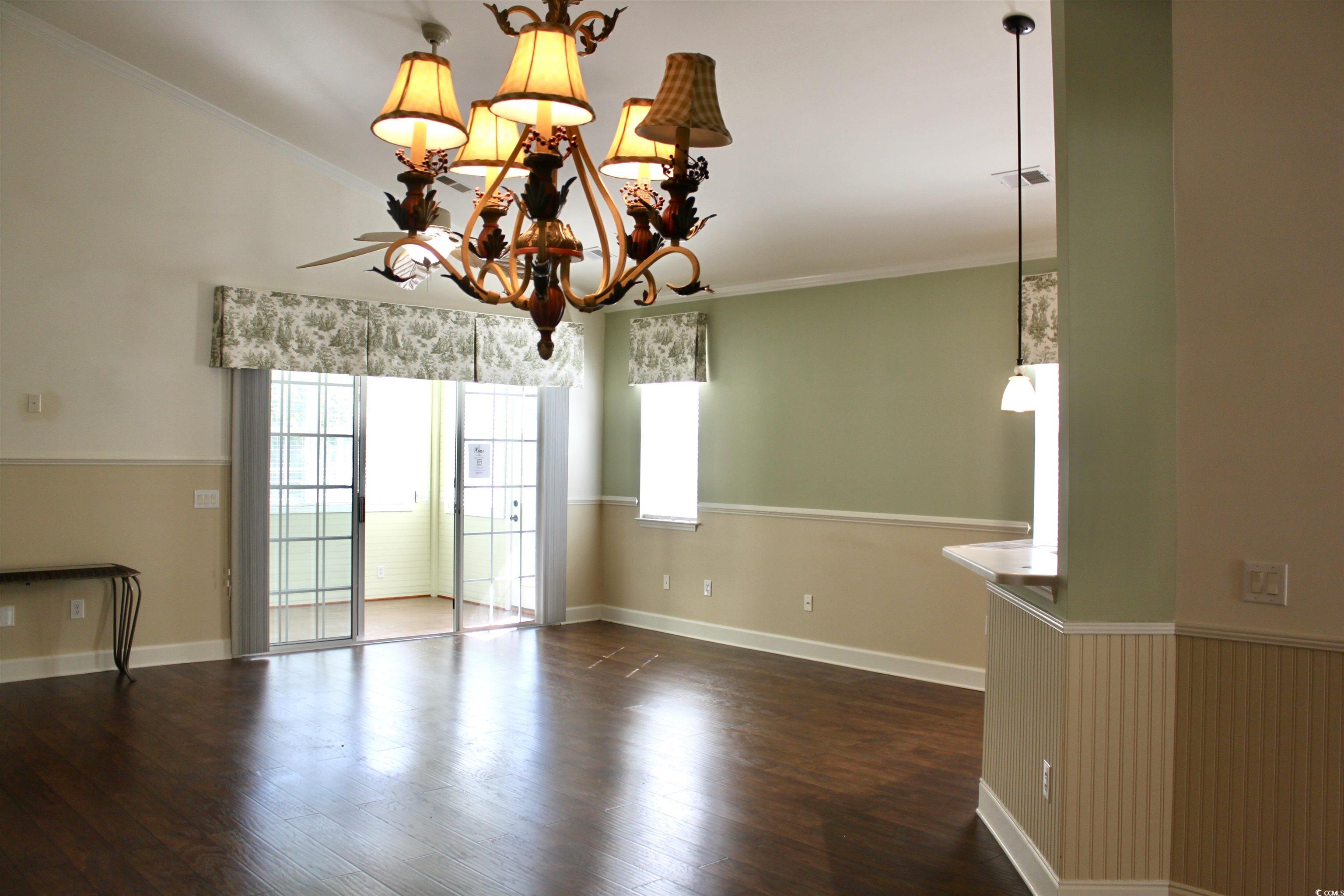 854 Laquinta Loop Murrells Inlet, SC 29576 - Photo 12 of 38 Empty room featuring wood-type flooring, a notable