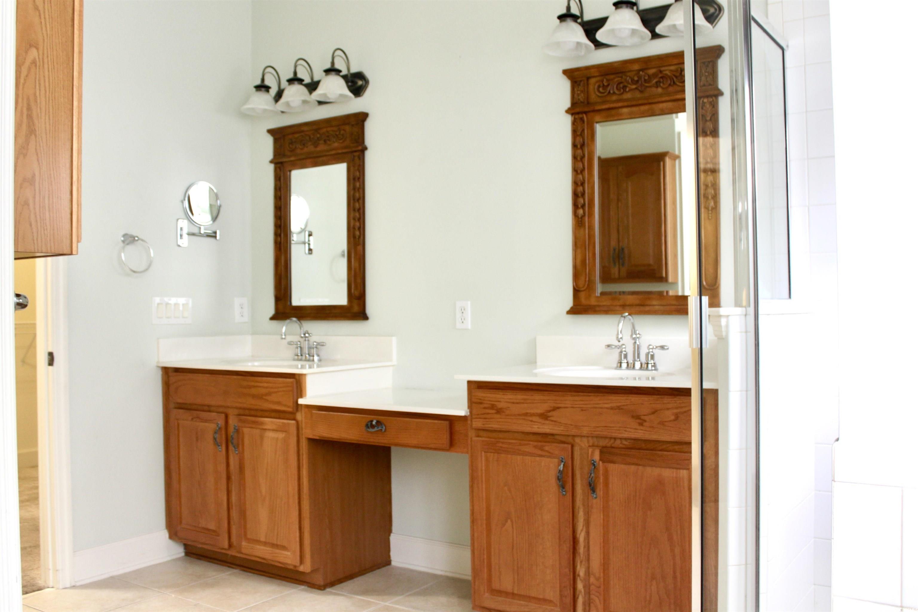 854 Laquinta Loop Murrells Inlet, SC 29576 - Photo 17 of 38 Bathroom featuring tile patterned flooring, an enc