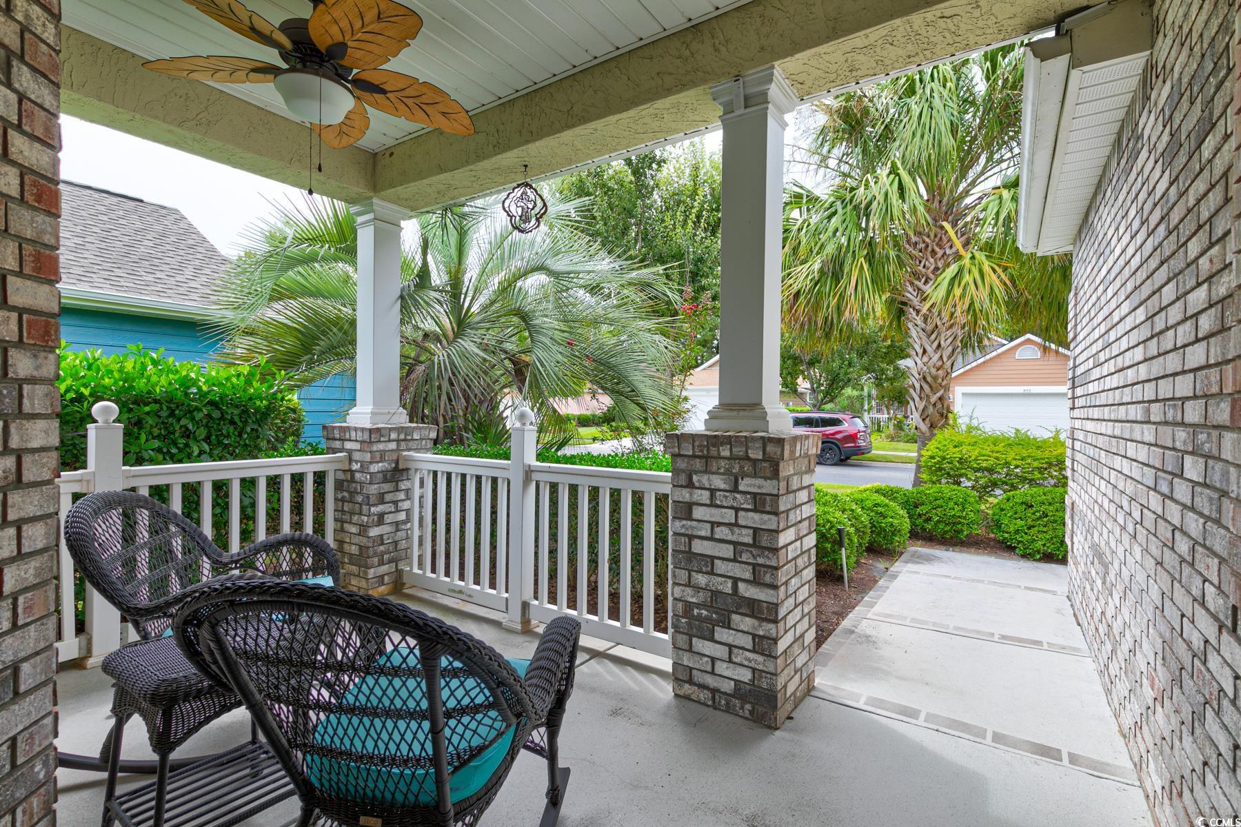 854 Laquinta Loop Murrells Inlet, SC 29576 - Photo 2 of 38 View of patio with ceiling fan and a porch