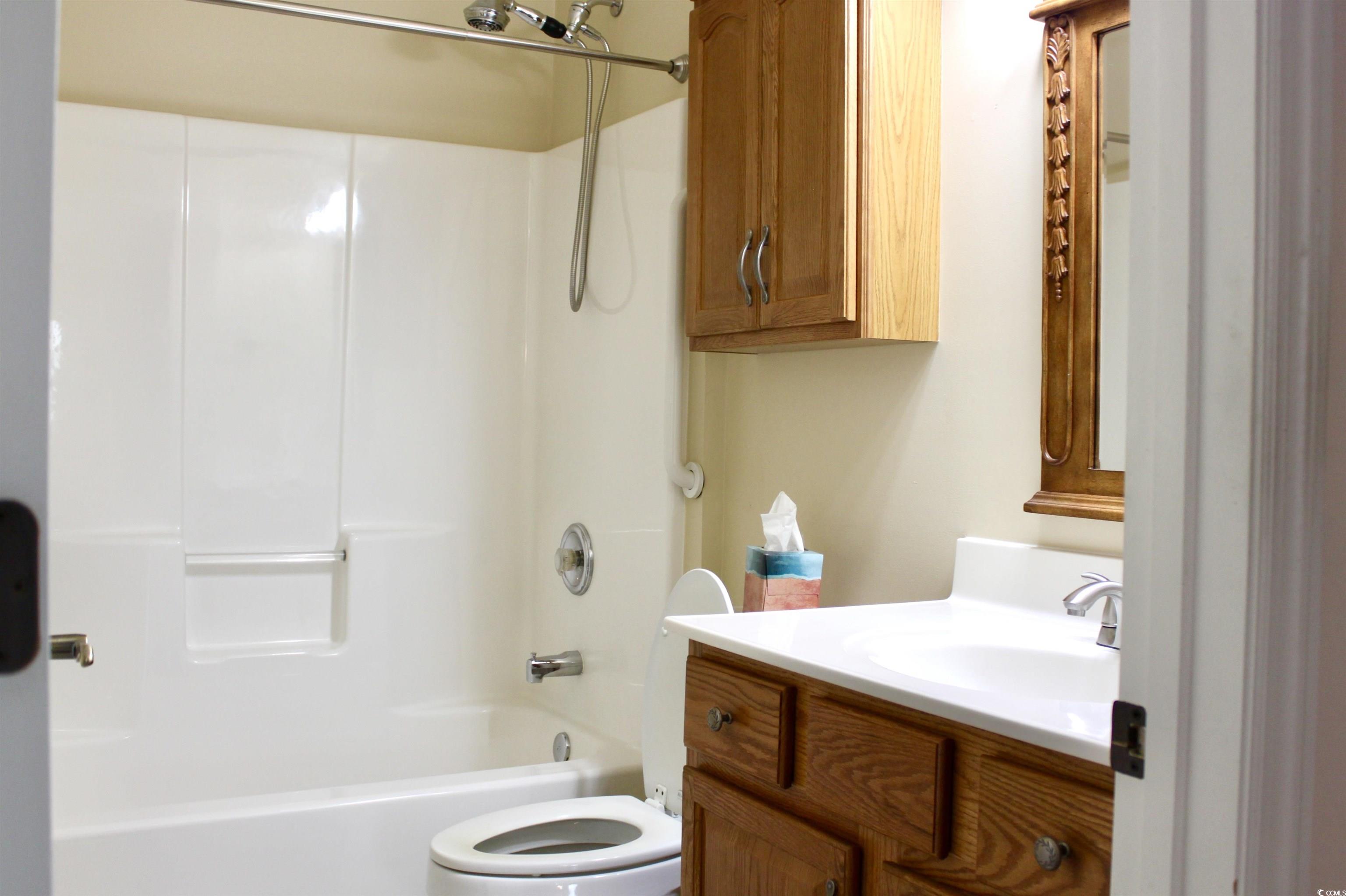 854 Laquinta Loop Murrells Inlet, SC 29576 - Photo 21 of 38 Full bathroom featuring bathing tub / shower combi