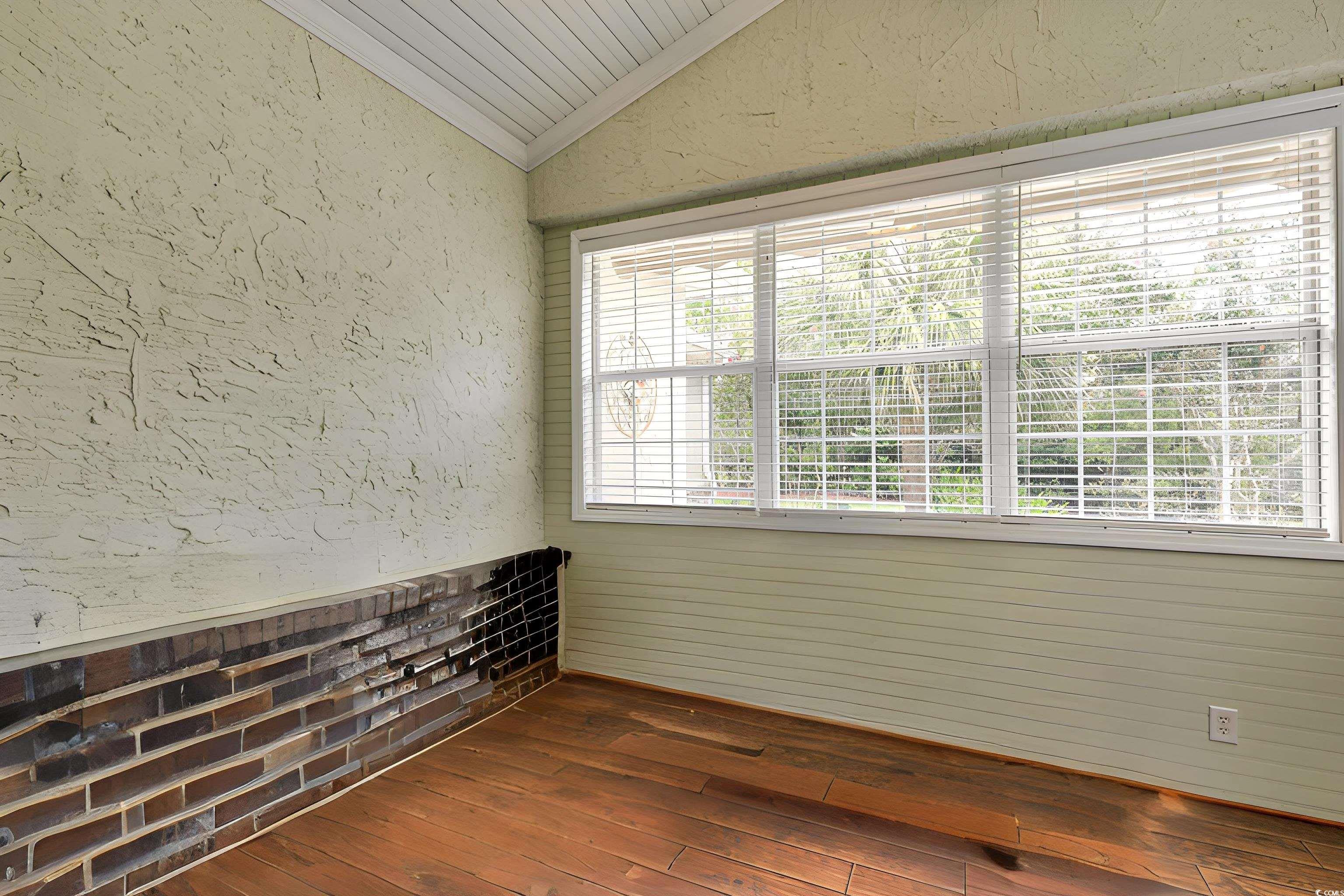 854 Laquinta Loop Murrells Inlet, SC 29576 - Photo 25 of 38 Unfurnished room featuring vaulted ceiling and dar