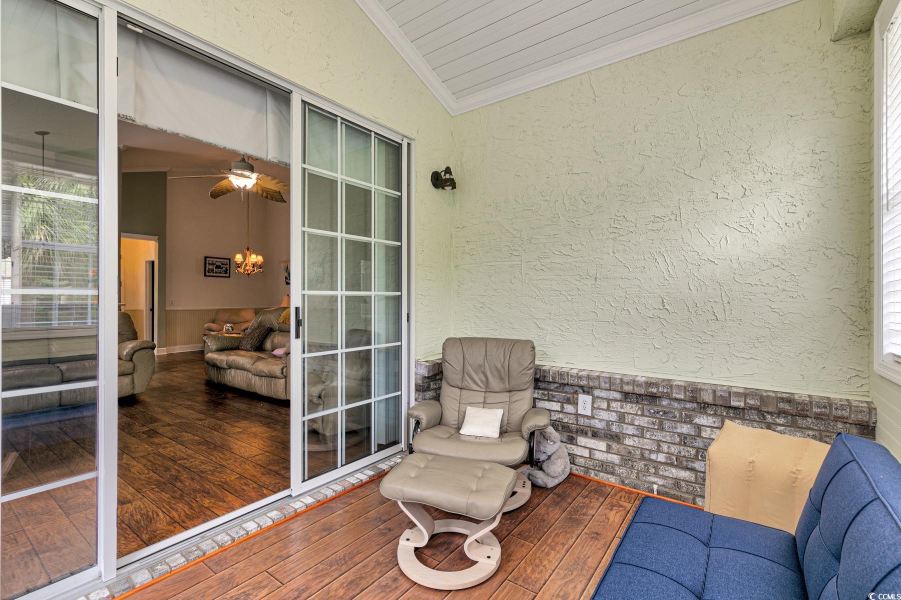 854 Laquinta Loop Murrells Inlet, SC 29576 - Photo 26 of 38 Exterior space with lofted ceiling, ceiling fan, o