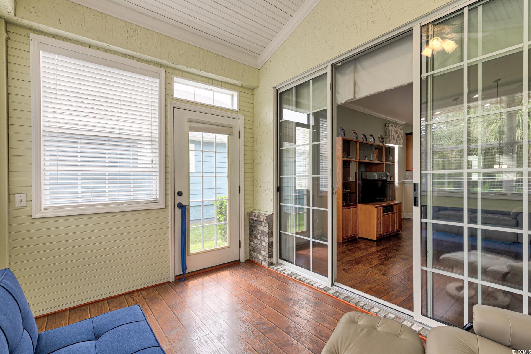 854 Laquinta Loop Murrells Inlet, SC 29576 - Photo 27 of 38 Sunroom featuring lofted ceiling