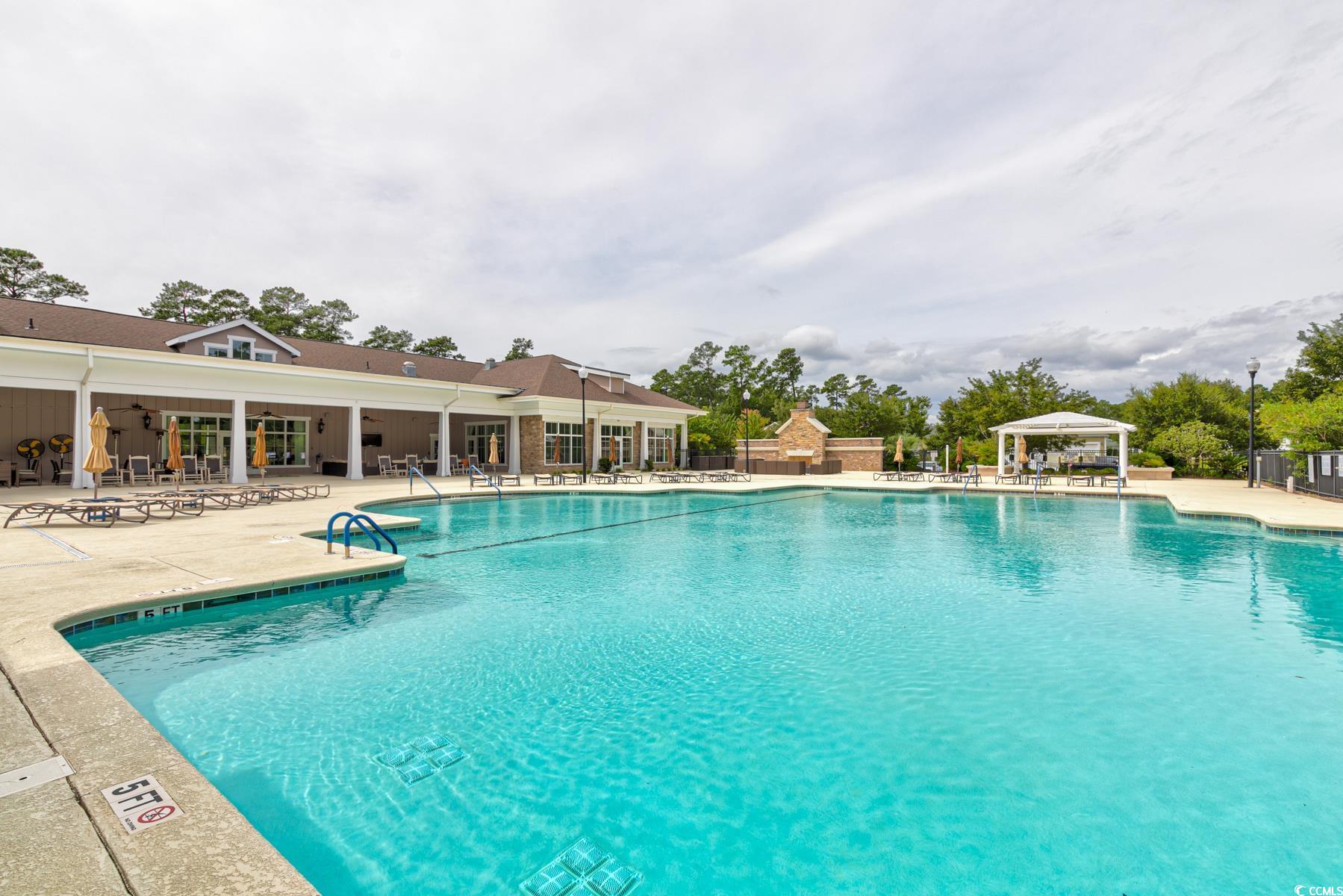 854 Laquinta Loop Murrells Inlet, SC 29576 - Photo 35 of 38 View of pool featuring a patio area