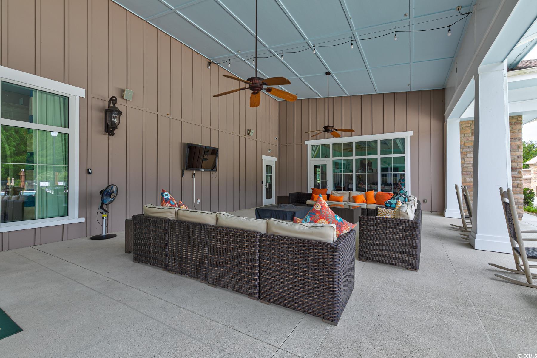 854 Laquinta Loop Murrells Inlet, SC 29576 - Photo 37 of 38 View of patio / terrace with an outdoor living spa