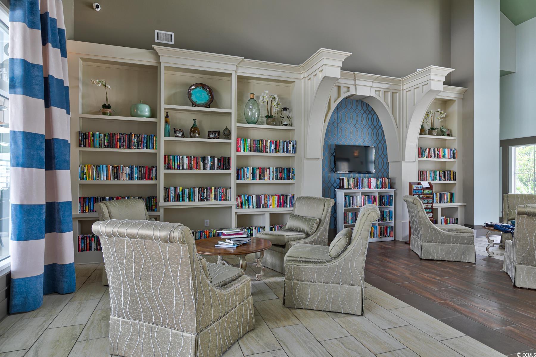 854 Laquinta Loop Murrells Inlet, SC 29576 - Photo 38 of 38 Sitting room with built in features, a high ceilin