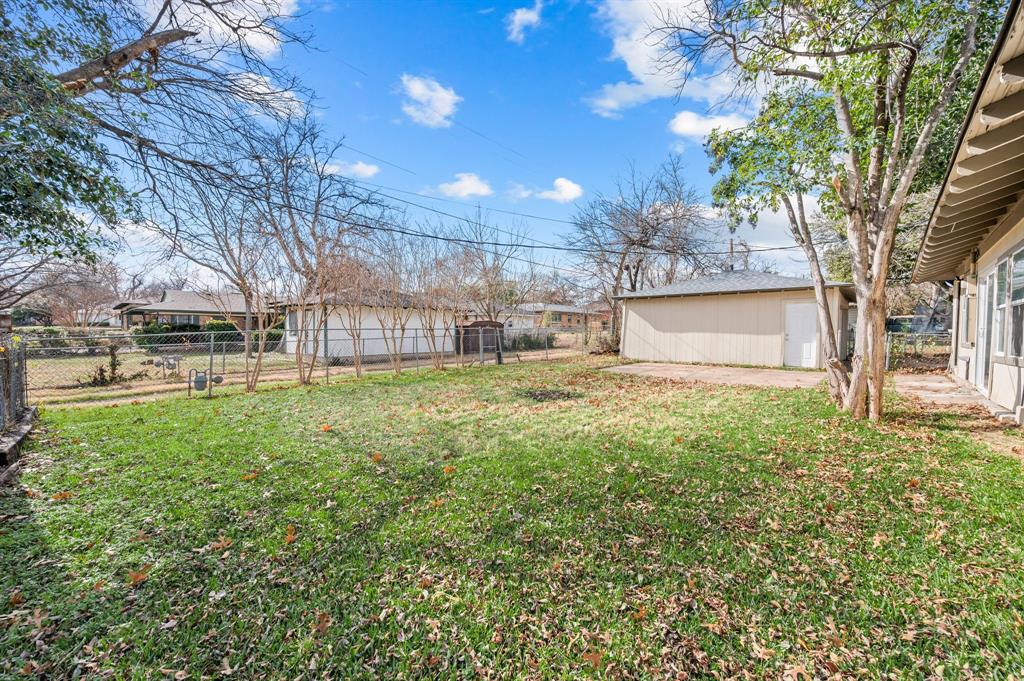 904 Treasure Road Garland, TX 75041 - Photo 25 of 27 a view of a yard with a house