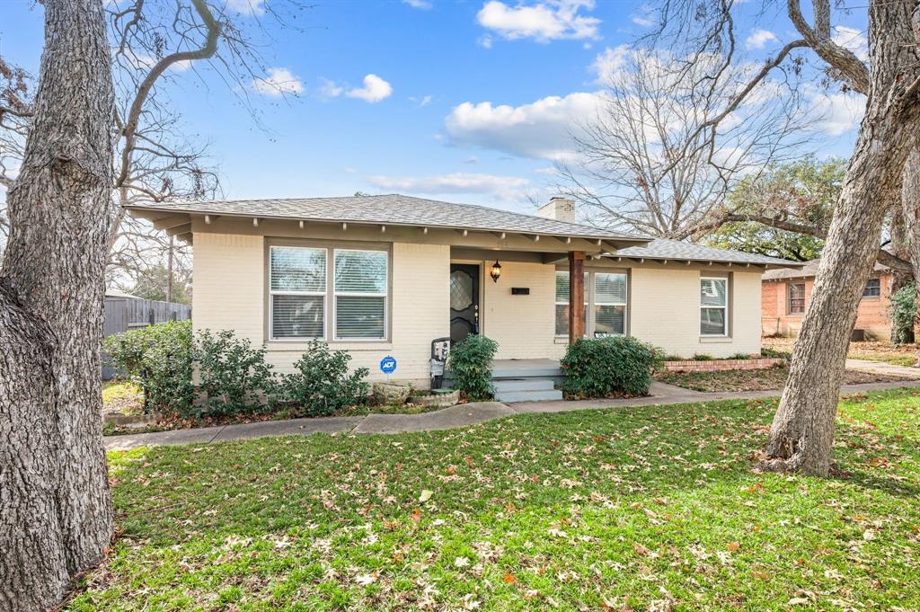 904 Treasure Road Garland, TX 75041 - Photo 3 of 27 a front view of house with yard and green space