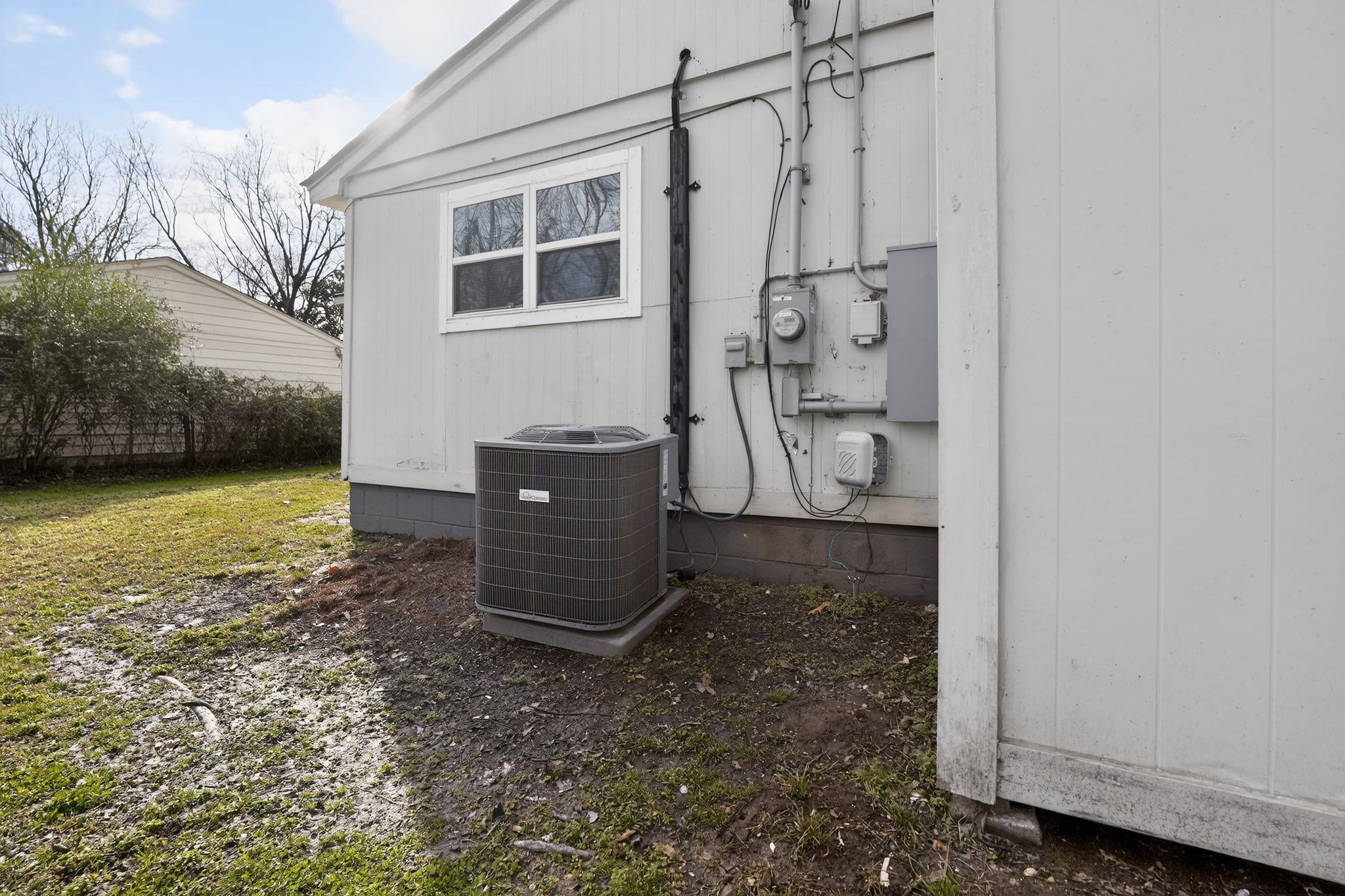 4212 Falcon Drive Memphis, TN 38109 - Photo 17 of 31 Exterior view of a cooling unit and electric meter