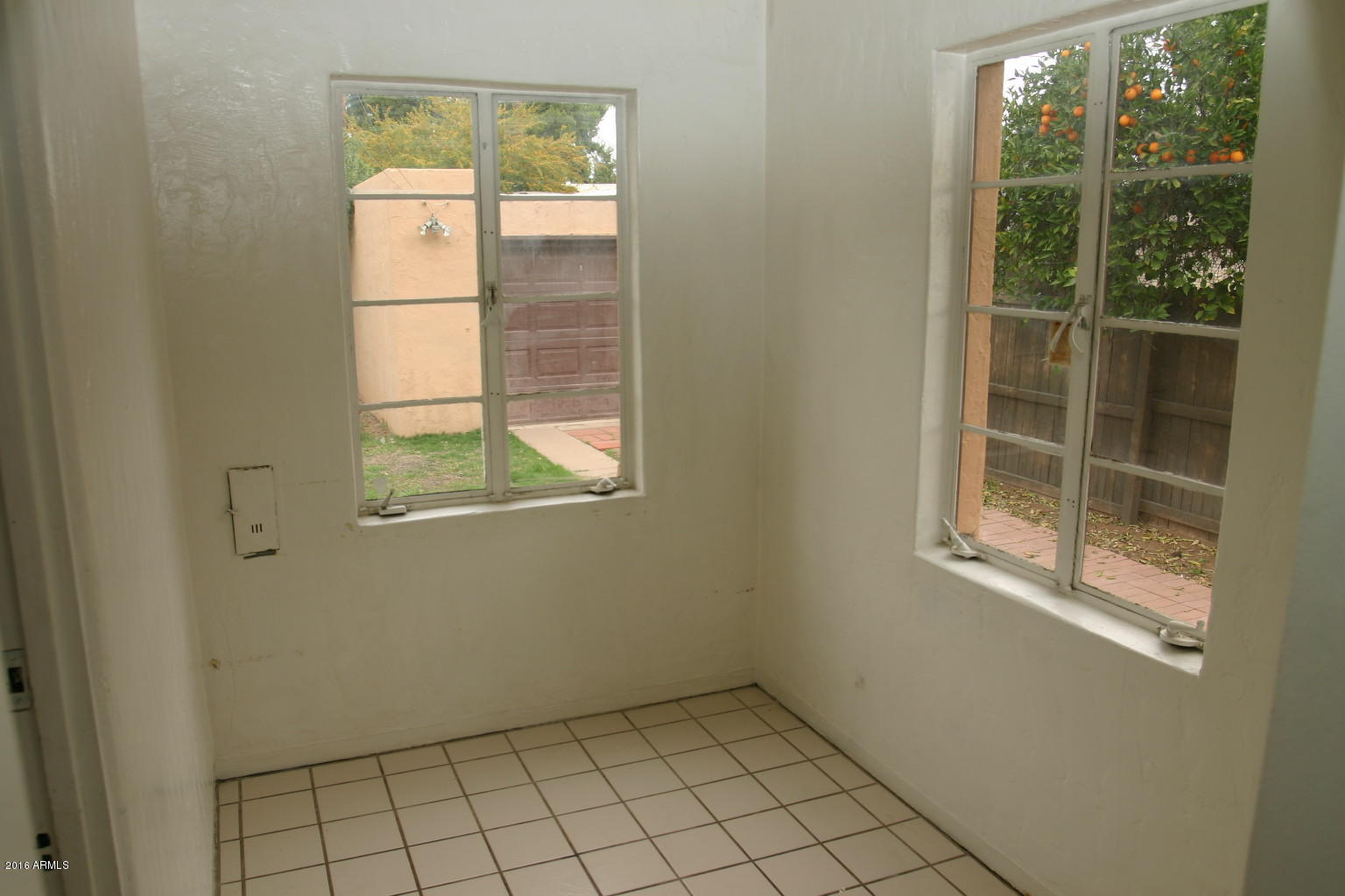 534 West Coronado Road Phoenix, AZ 85003 - Photo 21 of 27 a view of an empty room with a window