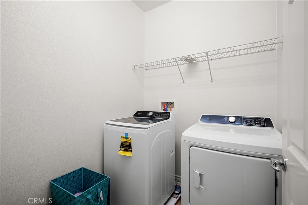 8652 Cava Drive Rancho Cucamonga, CA 91730 - Photo 21 of 28 a utility room with dryer and washer