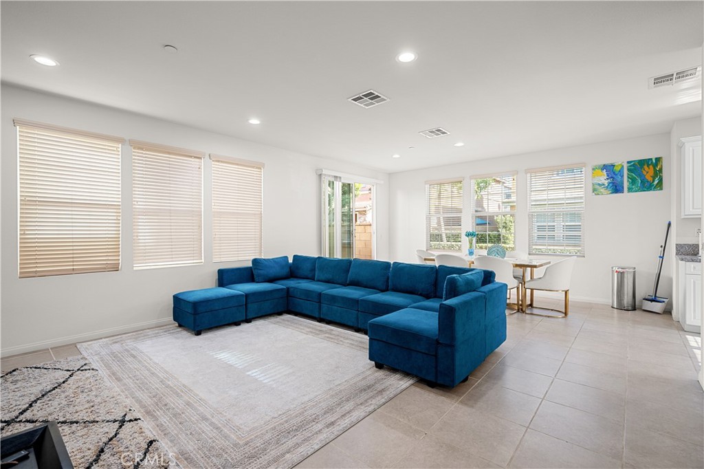 8652 Cava Drive Rancho Cucamonga, CA 91730 - Photo 5 of 28 a living room with furniture and a window