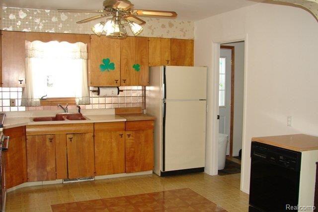 6736 Jones Road North Branch, MI 48461 - Photo 11 of 24 Kitchen going to laundry room an