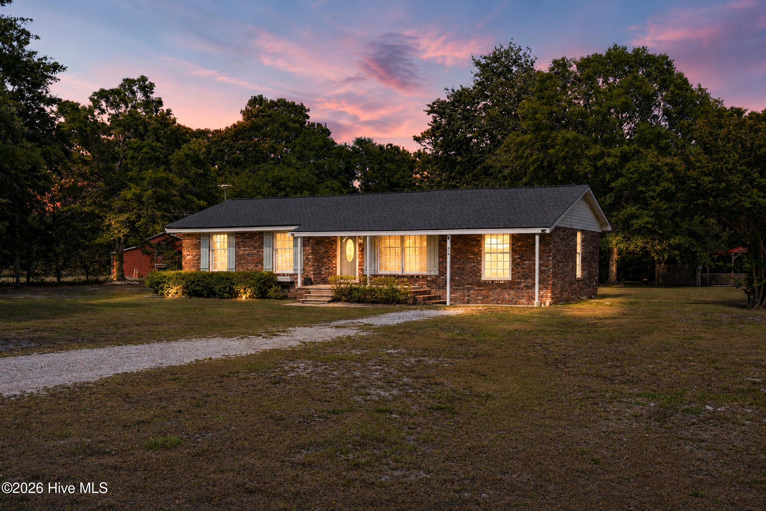 879 Bricklanding Road Southwest Shallotte, NC 28470 - Photo 4 of 56 Font of home - night view.