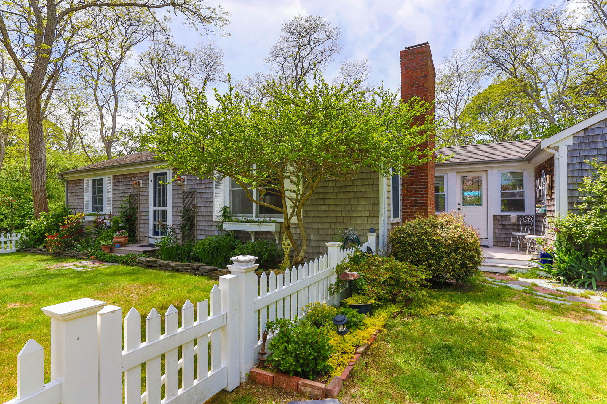 a house view with a garden space