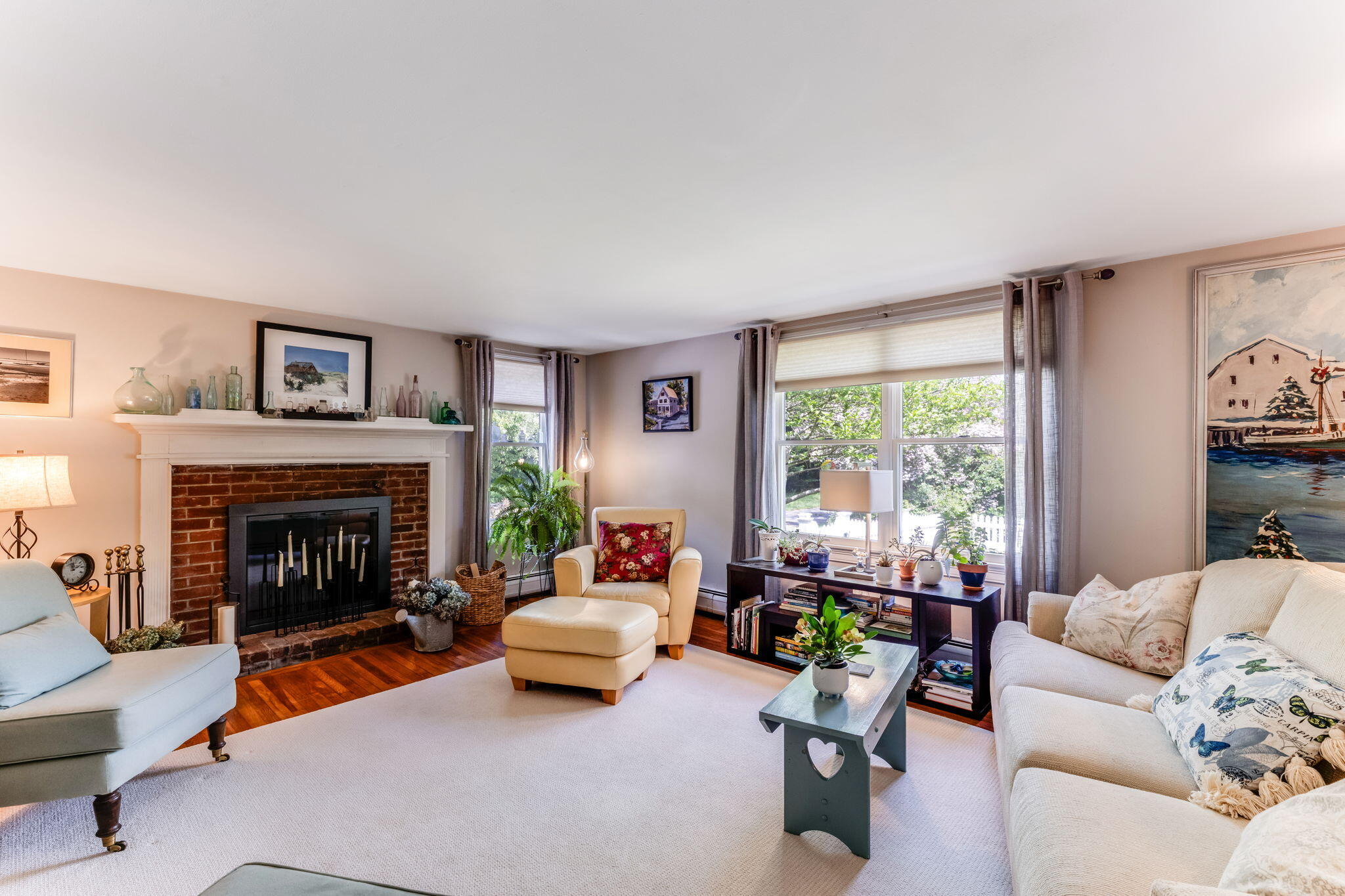 4975 State Highway, Unit A Eastham, MA 02642 - Photo 18 of 44 a living room with furniture and a fireplace