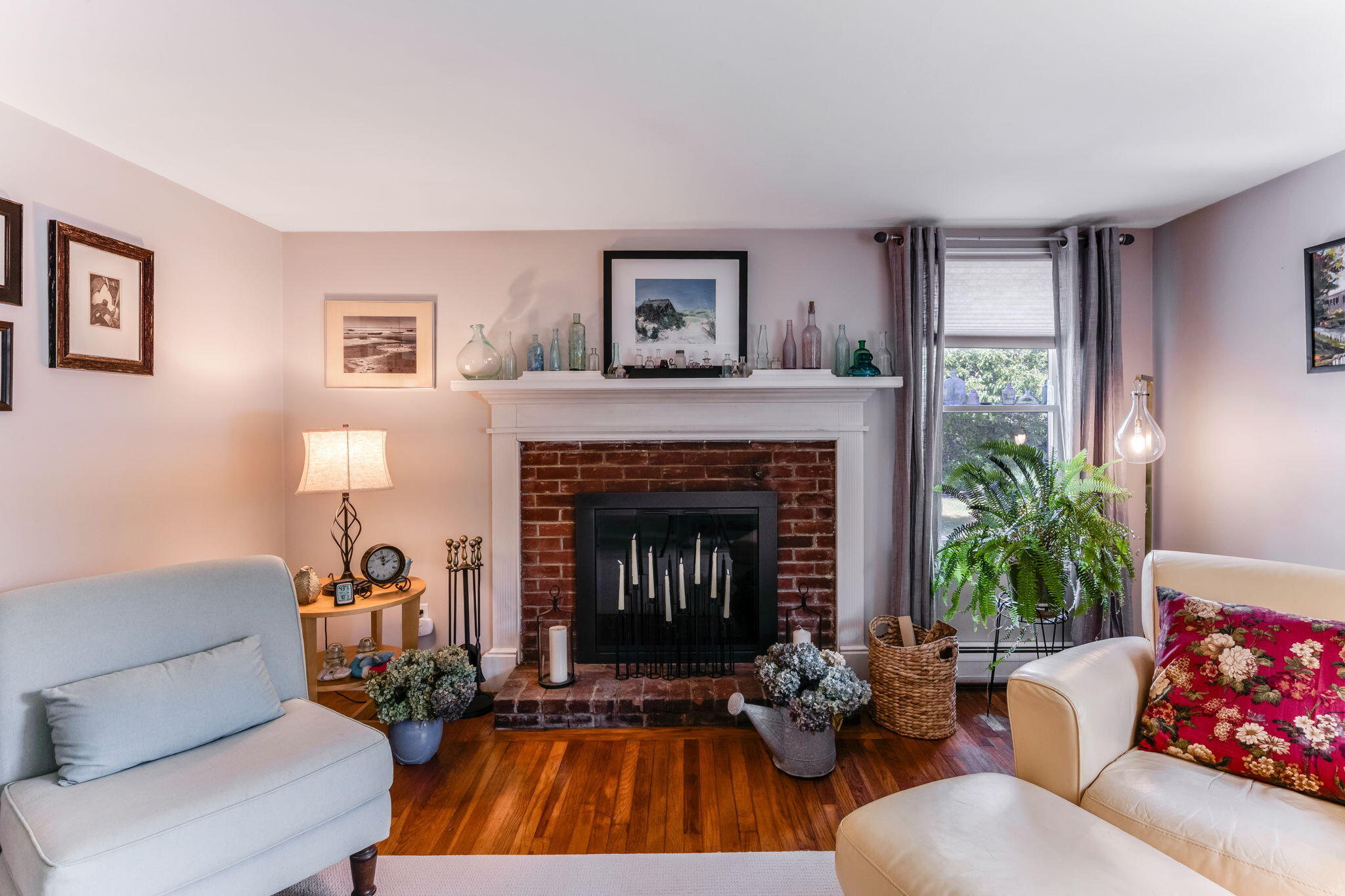 4975 State Highway, Unit A Eastham, MA 02642 - Photo 19 of 44 a living room with furniture and a fireplace
