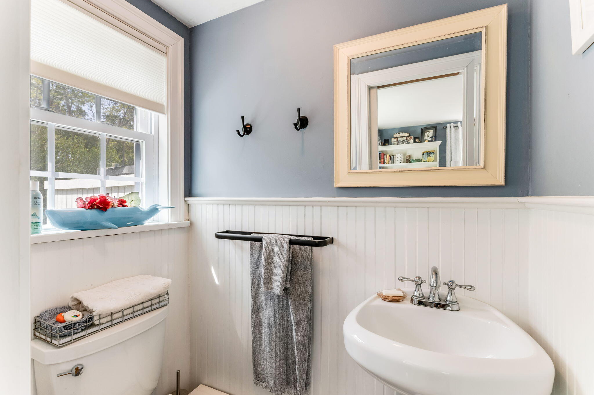 4975 State Highway, Unit A Eastham, MA 02642 - Photo 31 of 44 a bathroom with a sink and a mirror