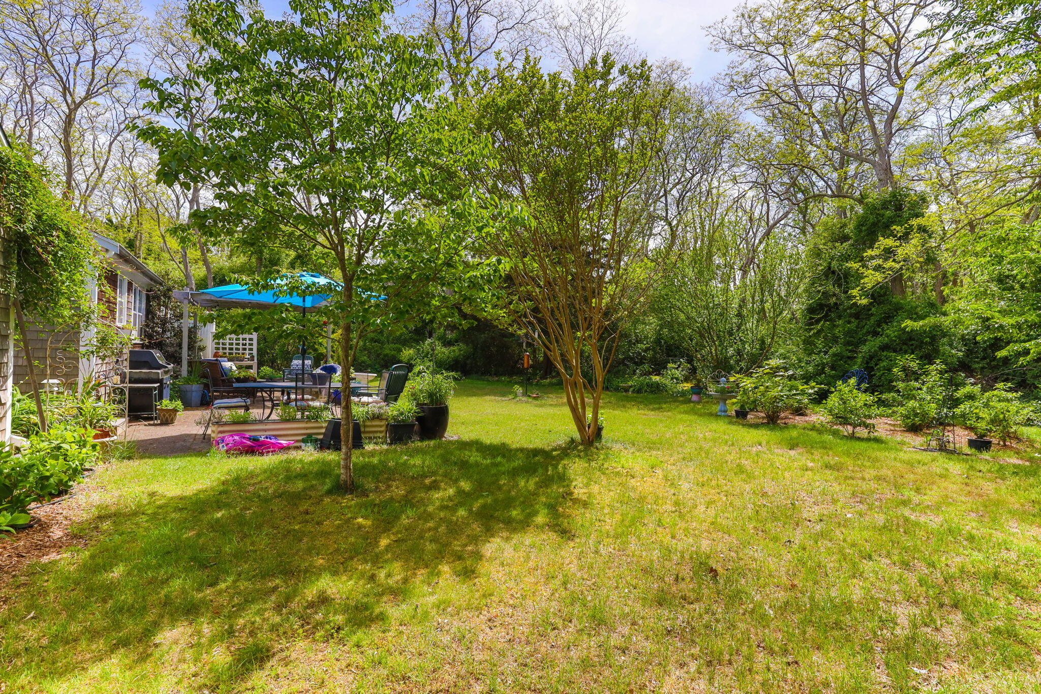 4975 State Highway, Unit A Eastham, MA 02642 - Photo 42 of 44 a view of yard with swimming pool and sitting area