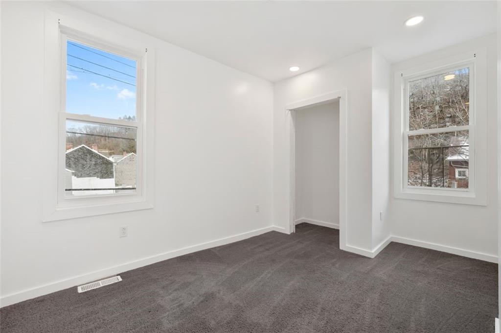 1619 Haug Street Pittsburgh, PA 15212 - Photo 15 of 27 a view of an empty room with a window